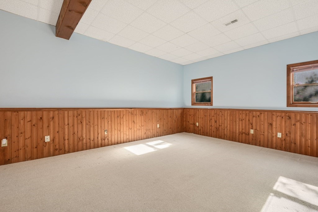 2020 Bay Road Stoughton, MA 02072 - Photo 28 of 38 a view of a room with wooden floor and windows