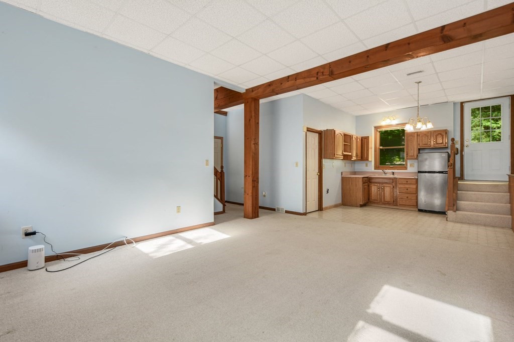 2020 Bay Road Stoughton, MA 02072 - Photo 30 of 38 a view of a livingroom with a kitchen