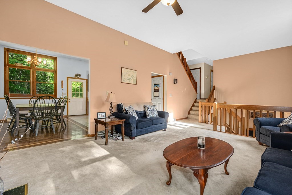 2020 Bay Road Stoughton, MA 02072 - Photo 8 of 38 a living room with furniture and a rug