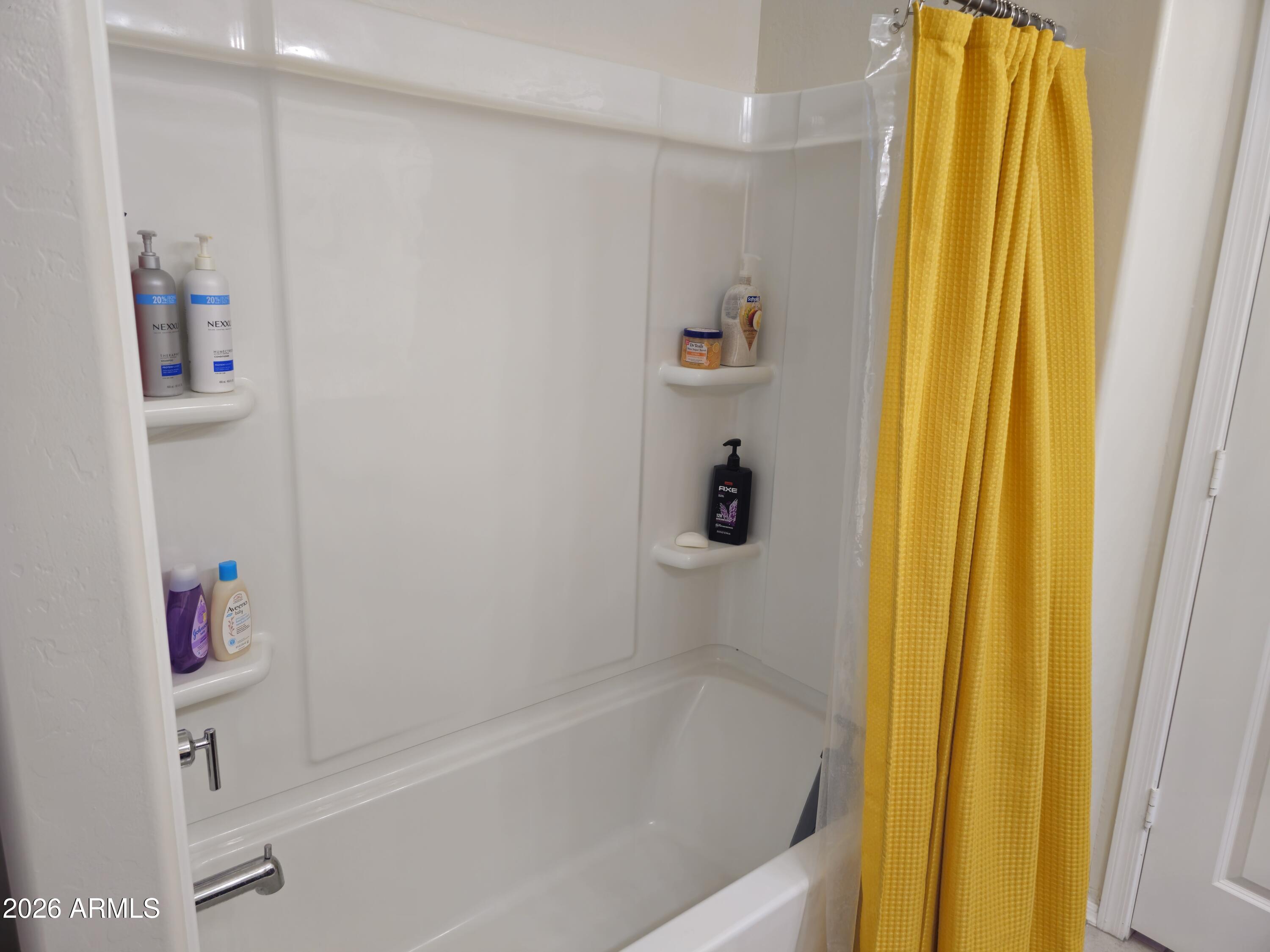 9434 Cotton Road Florence, AZ 85132 - Photo 19 of 25 a bathroom with a bathtub