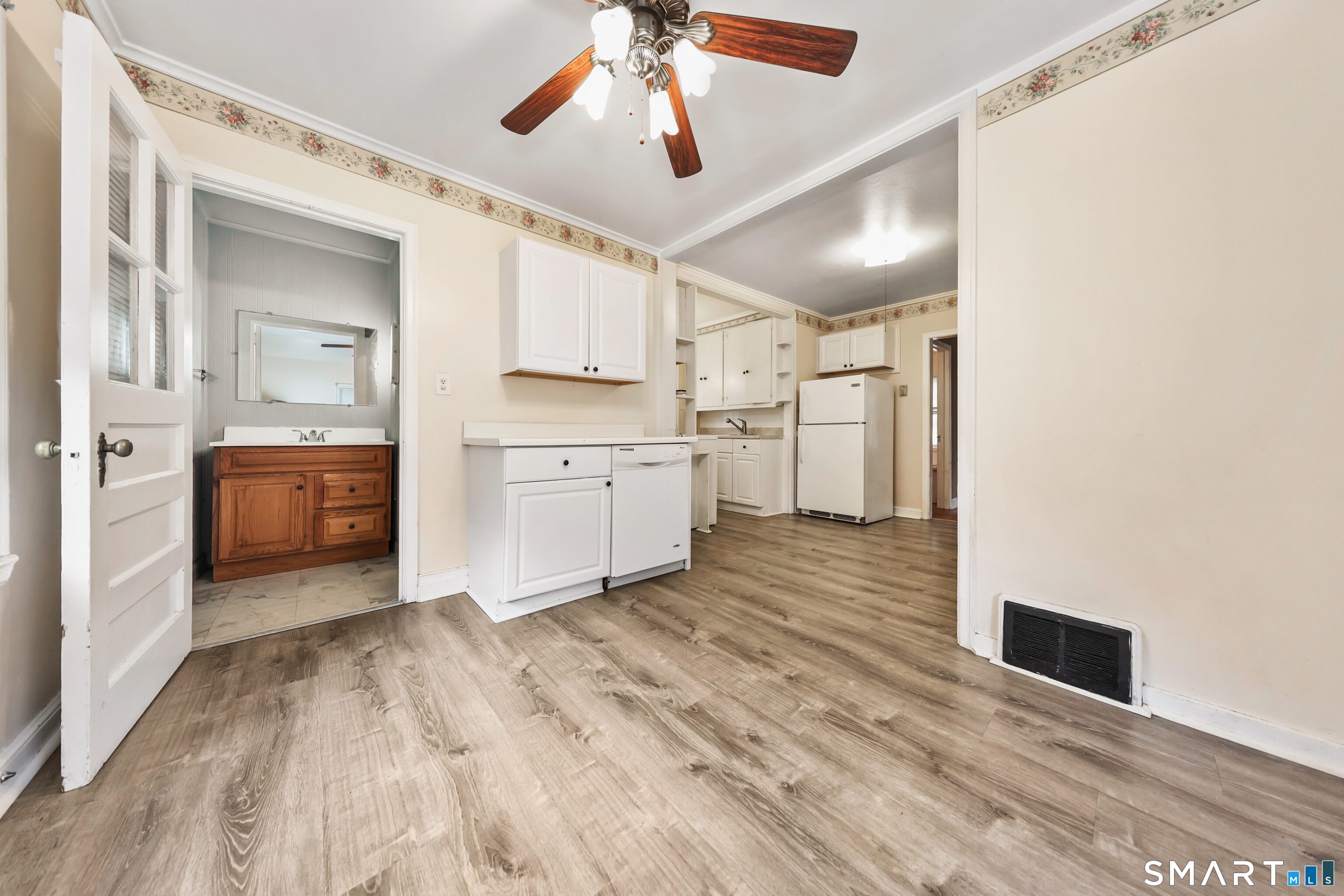 125 Tioga Street Torrington, CT 06790 - Photo 14 of 40 a room with a bed and cabinets