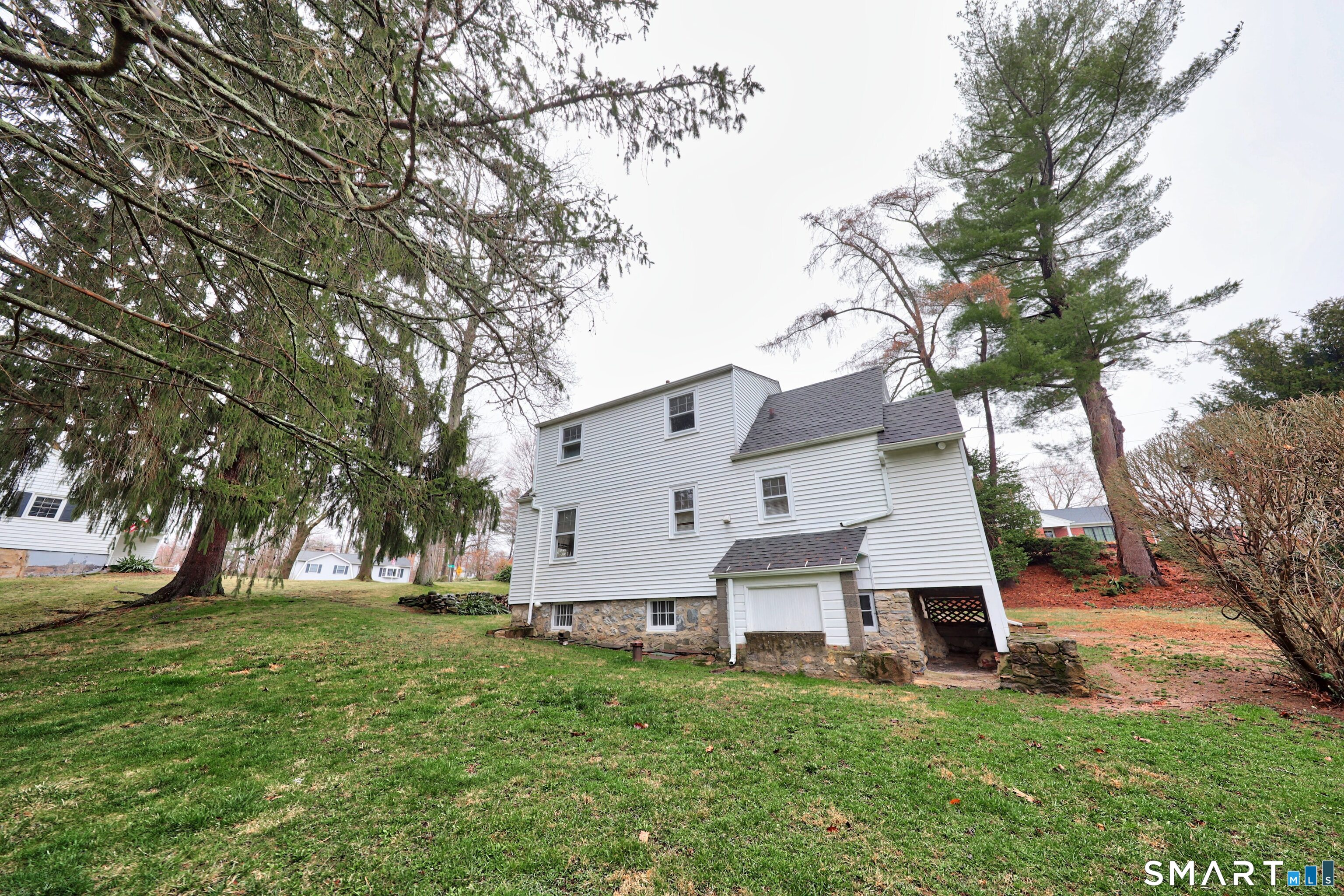 125 Tioga Street Torrington, CT 06790 - Photo 2 of 40 a view of house with backyard