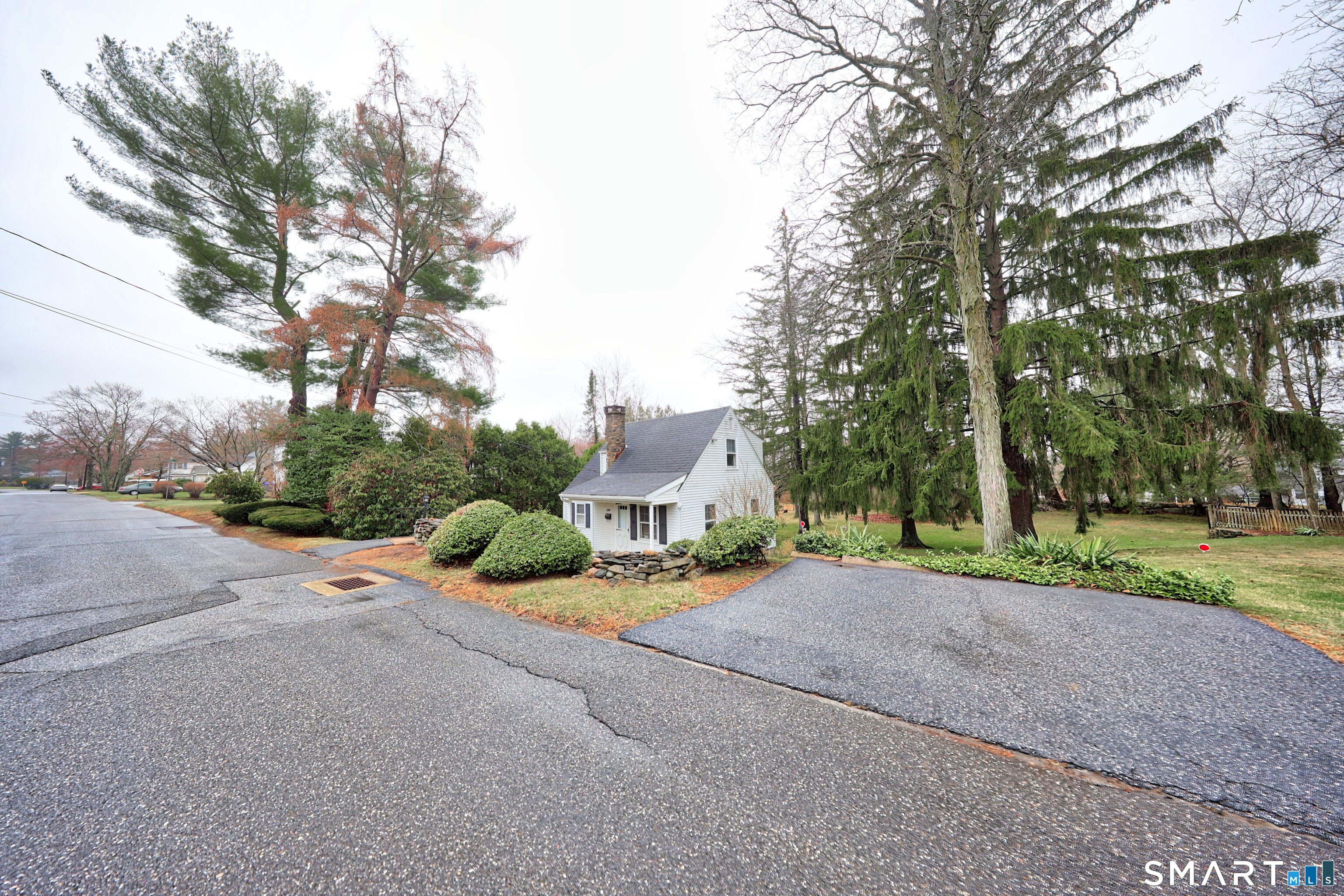 125 Tioga Street Torrington, CT 06790 - Photo 36 of 40 a view of a road with a house in the background
