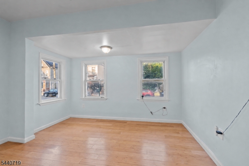 136 Smith Street Elizabeth, NJ 07201 - Photo 16 of 38 a view of empty room with window