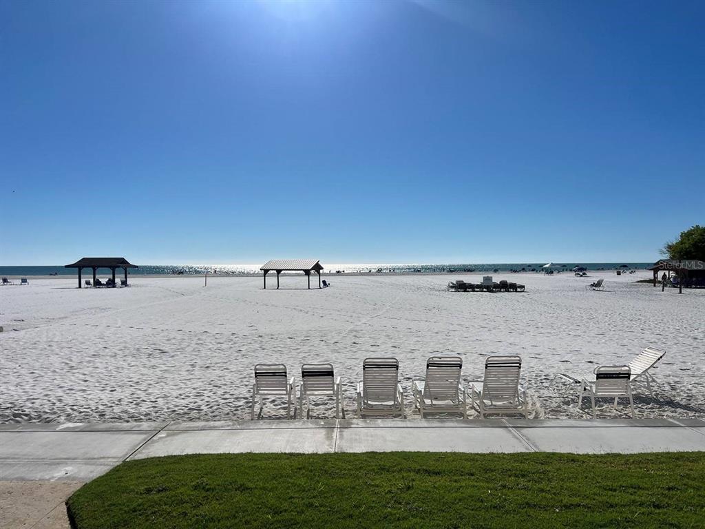 6006 Midnight Pass Road, Unit 40 Sarasota, FL 34242 - Photo 15 of 25 a view of a lake with houses