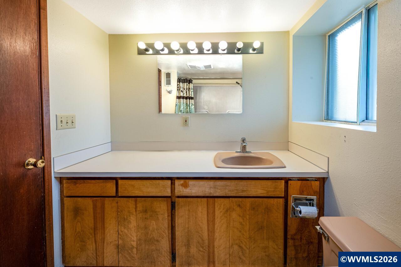 31359 Bryant Way Southwest Albany, OR 97321 - Photo 39 of 50 a bathroom with a sink and a mirror