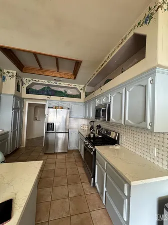 a dinning table and chairs in a room
