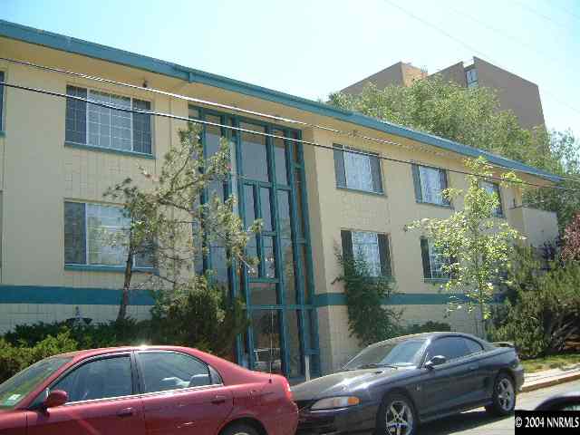 1140 Jones Street, Unit 24 Reno, NV 89503 - Photo 1 of 1 a front view of a house with car parked