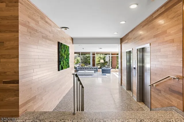 a view of a living room and a balcony