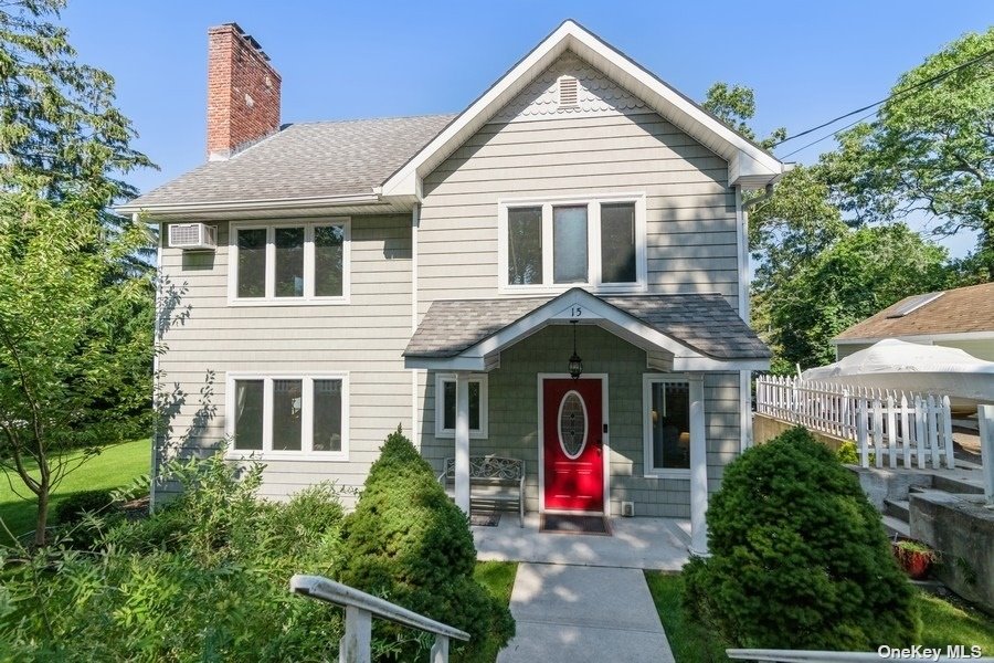 15 Hazel Road Rocky Point, NY 11778 - Photo 1 of 1 a front view of a house with a porch