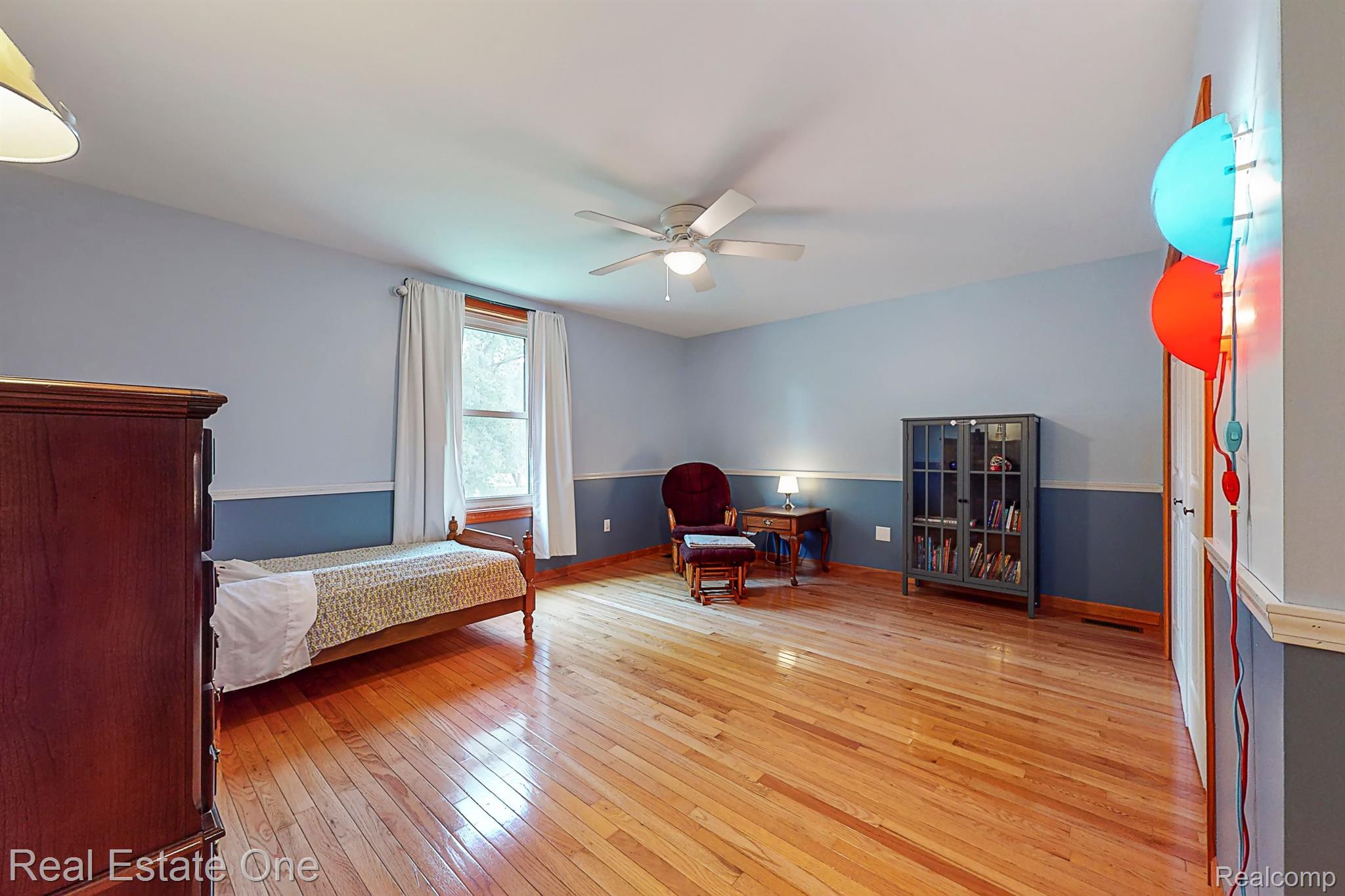 7448 Sharp Road Swartz Creek, MI 48473 - Photo 31 of 49 Gorgeous solid wood floors in large bed 3