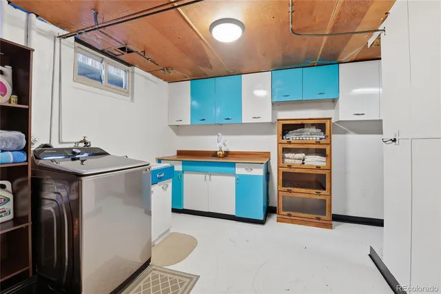 a kitchen with stainless steel appliances a refrigerator and a stove