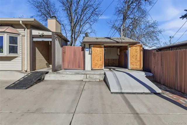 a view of a house with a snow on the wall