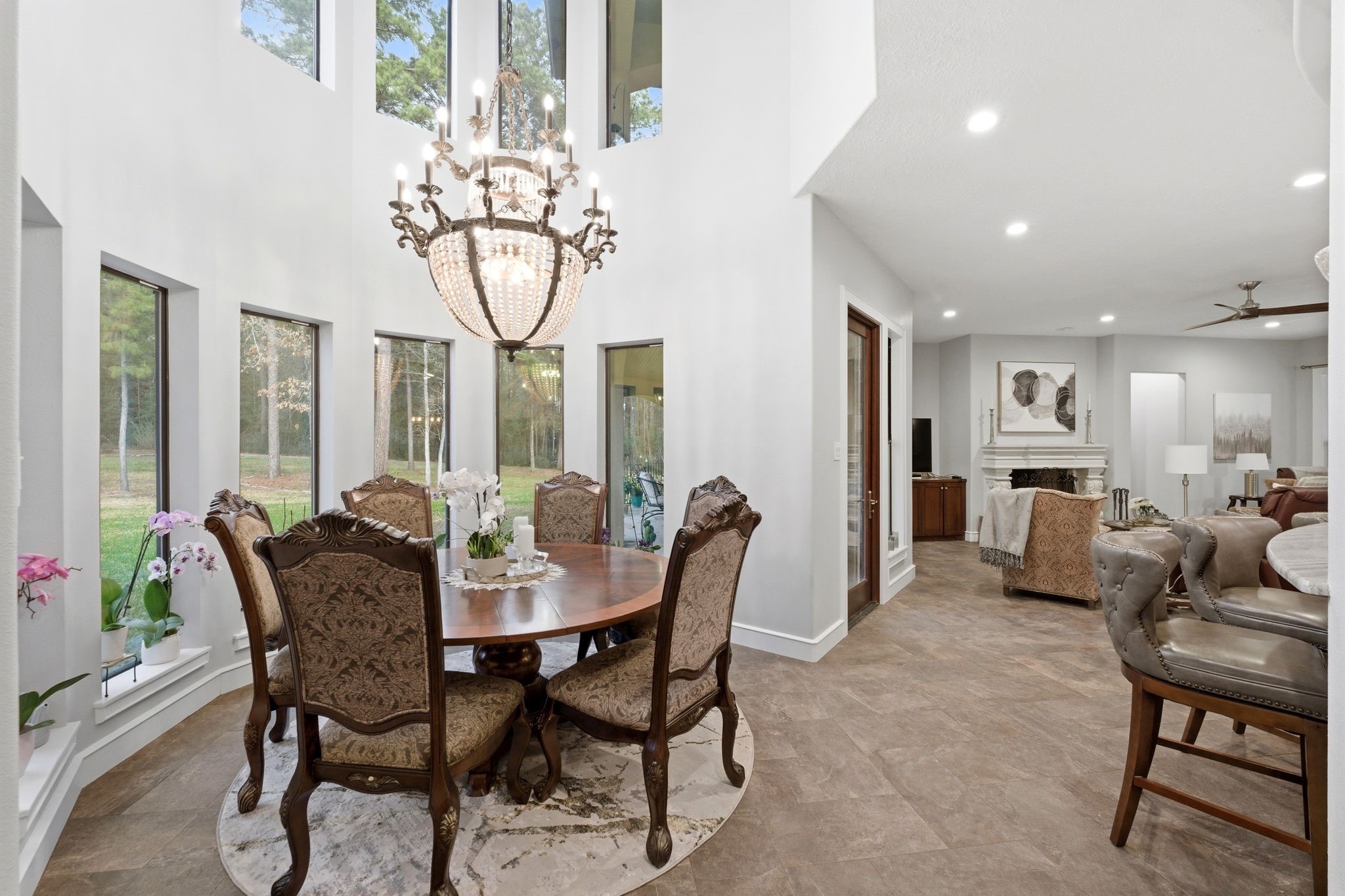 280 Sundog Road Huntsville, TX 77340 - Photo 8 of 50 This view of the dining room shows the open flow toward the family room and the breakfast bar that leads into the kitchen, creating an ideal layout for entertaining.