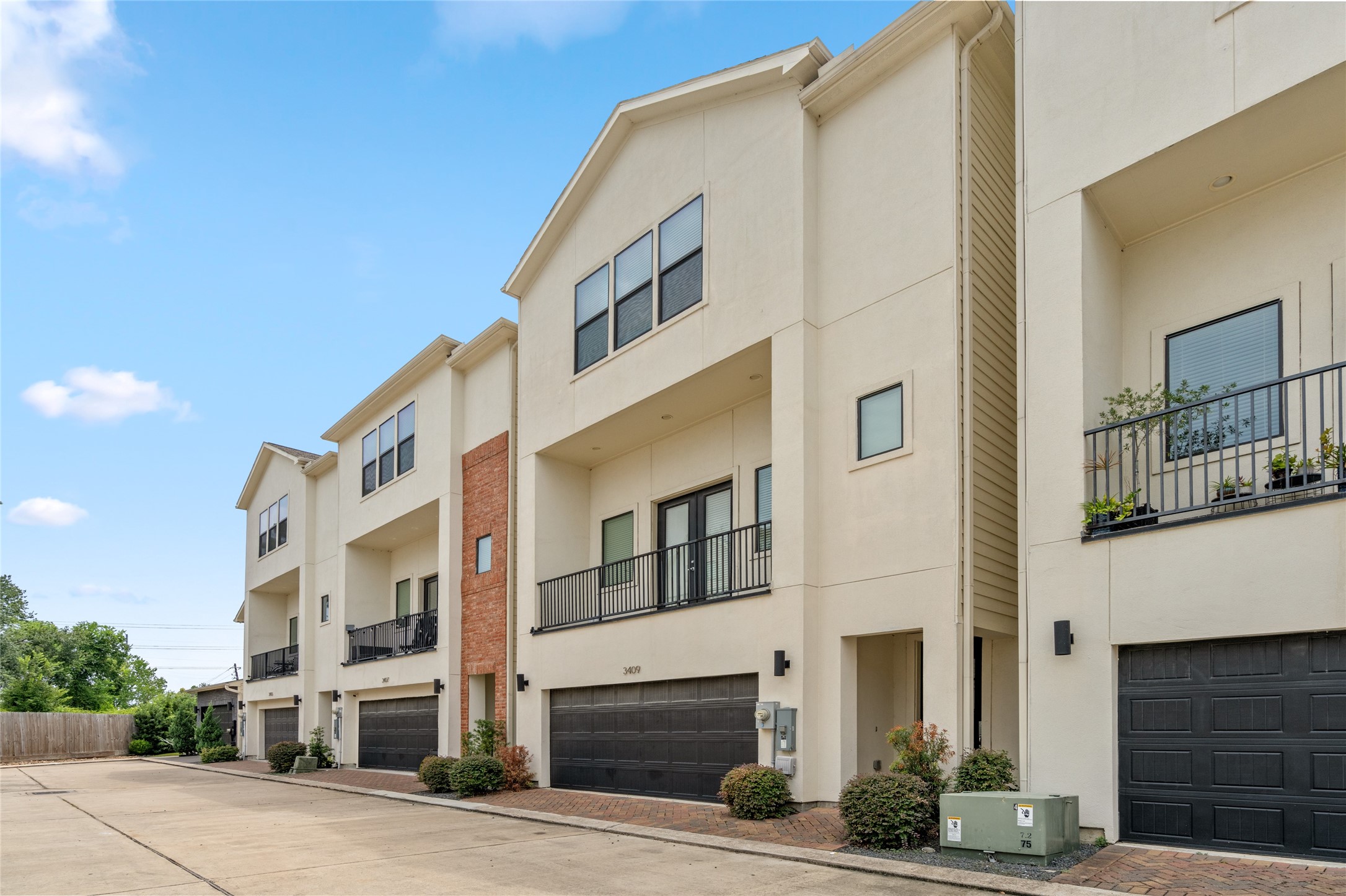 3409 Kensington Yellow Place Houston, TX 77008 - Photo 1 of 28 a front view of a building with street