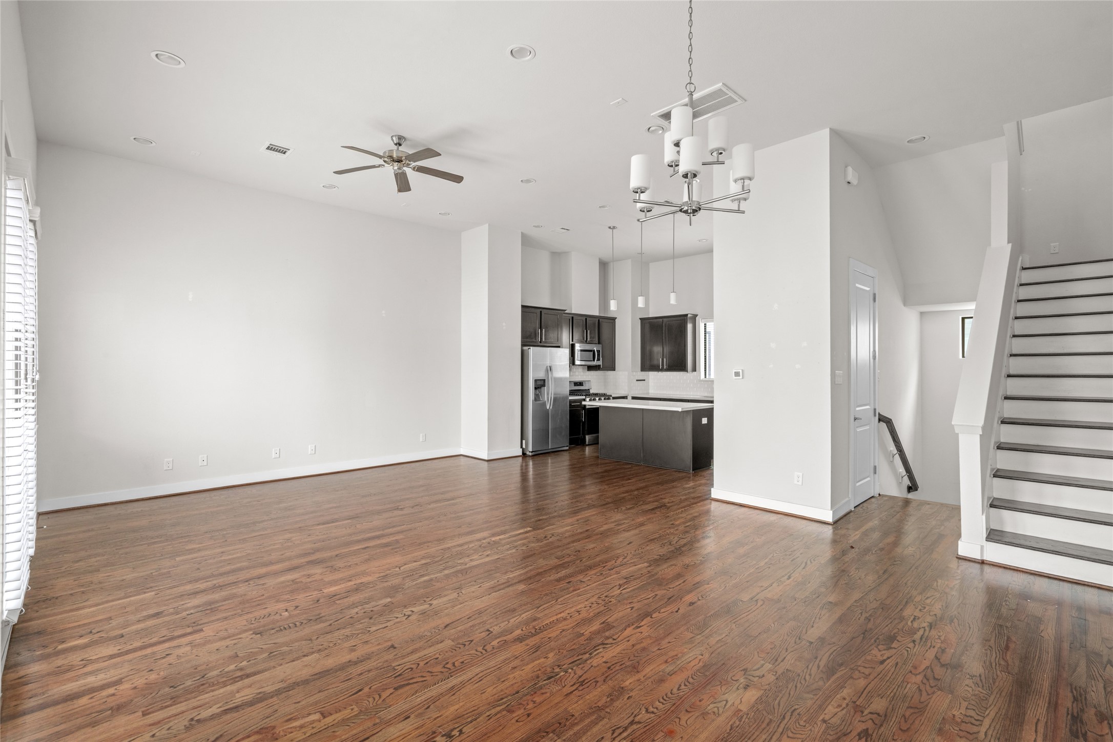 3409 Kensington Yellow Place Houston, TX 77008 - Photo 11 of 28 a view of a kitchen with a sink wooden floor and a kitchen