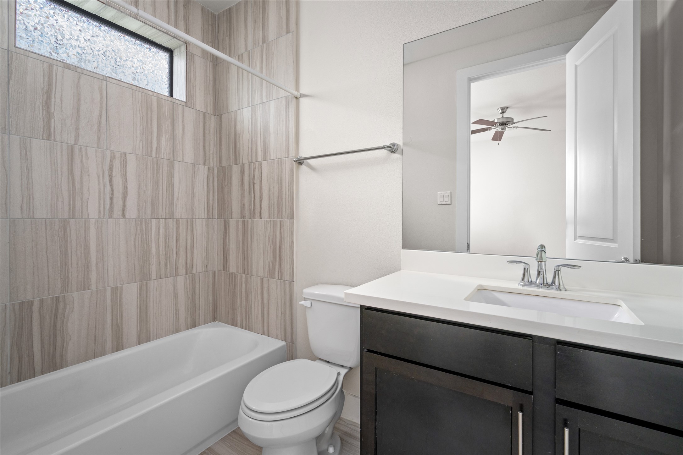 3409 Kensington Yellow Place Houston, TX 77008 - Photo 21 of 28 a bathroom with a sink a toilet and shower