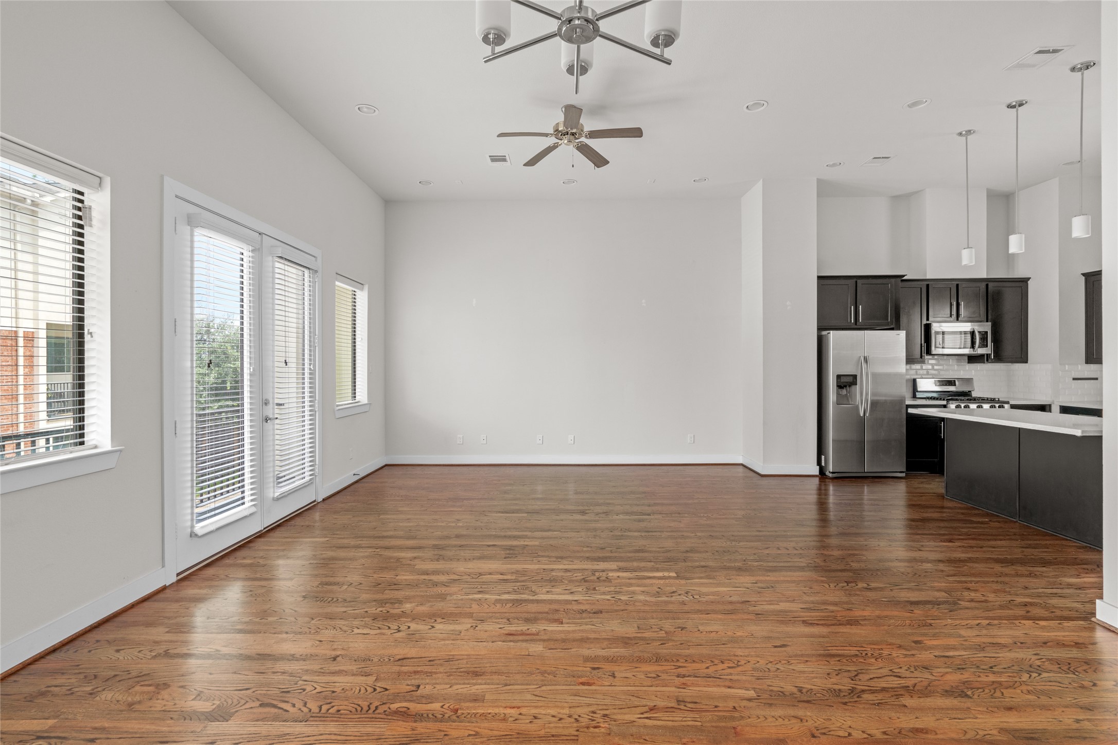 3409 Kensington Yellow Place Houston, TX 77008 - Photo 10 of 28 a view of kitchen with granite countertop cabinets and refrigerator