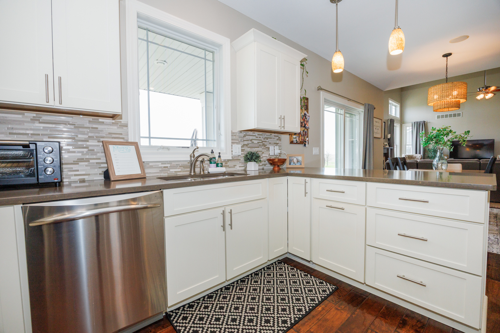 114 Mallard Way Hudson, IL 61748 - Photo 15 of 65 a kitchen with a sink stove and cabinets