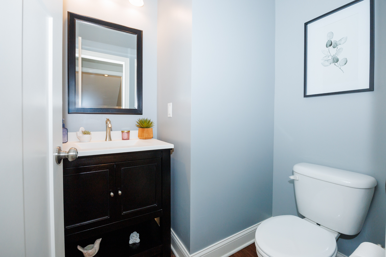 114 Mallard Way Hudson, IL 61748 - Photo 19 of 65 a bathroom with a toilet sink and mirror