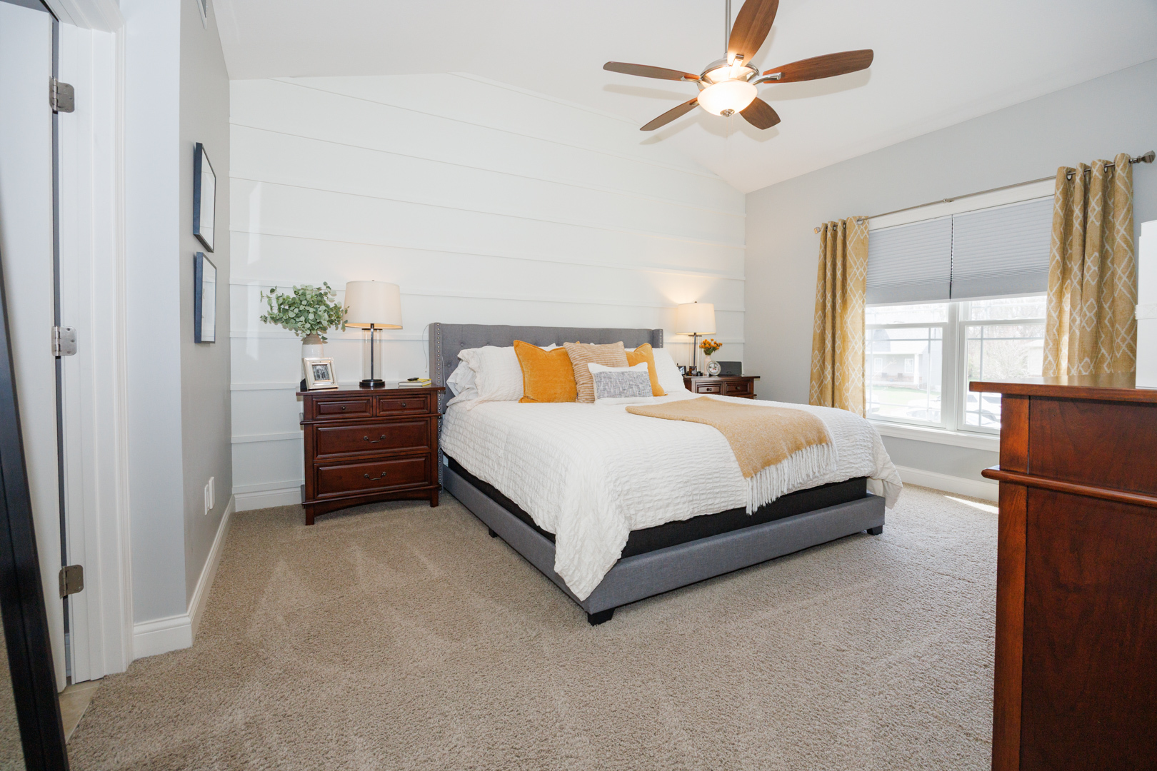 114 Mallard Way Hudson, IL 61748 - Photo 22 of 65 a bedroom with a bed dresser and a window
