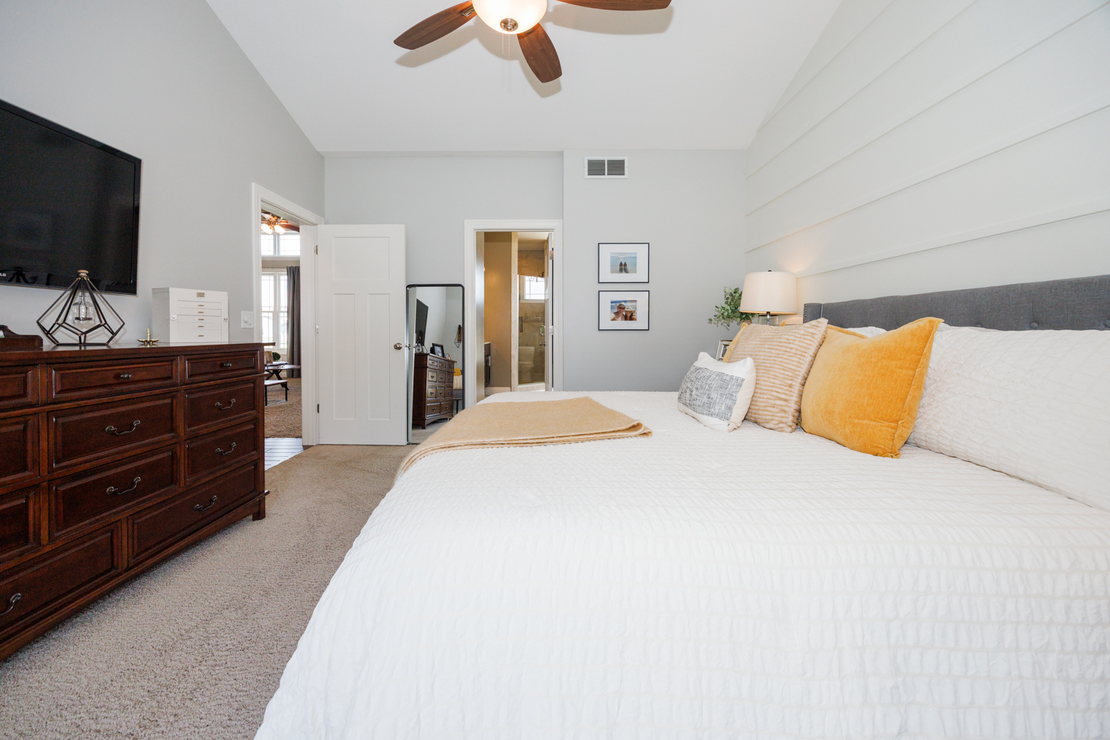 114 Mallard Way Hudson, IL 61748 - Photo 24 of 65 a bedroom with a bed and a flat screen tv