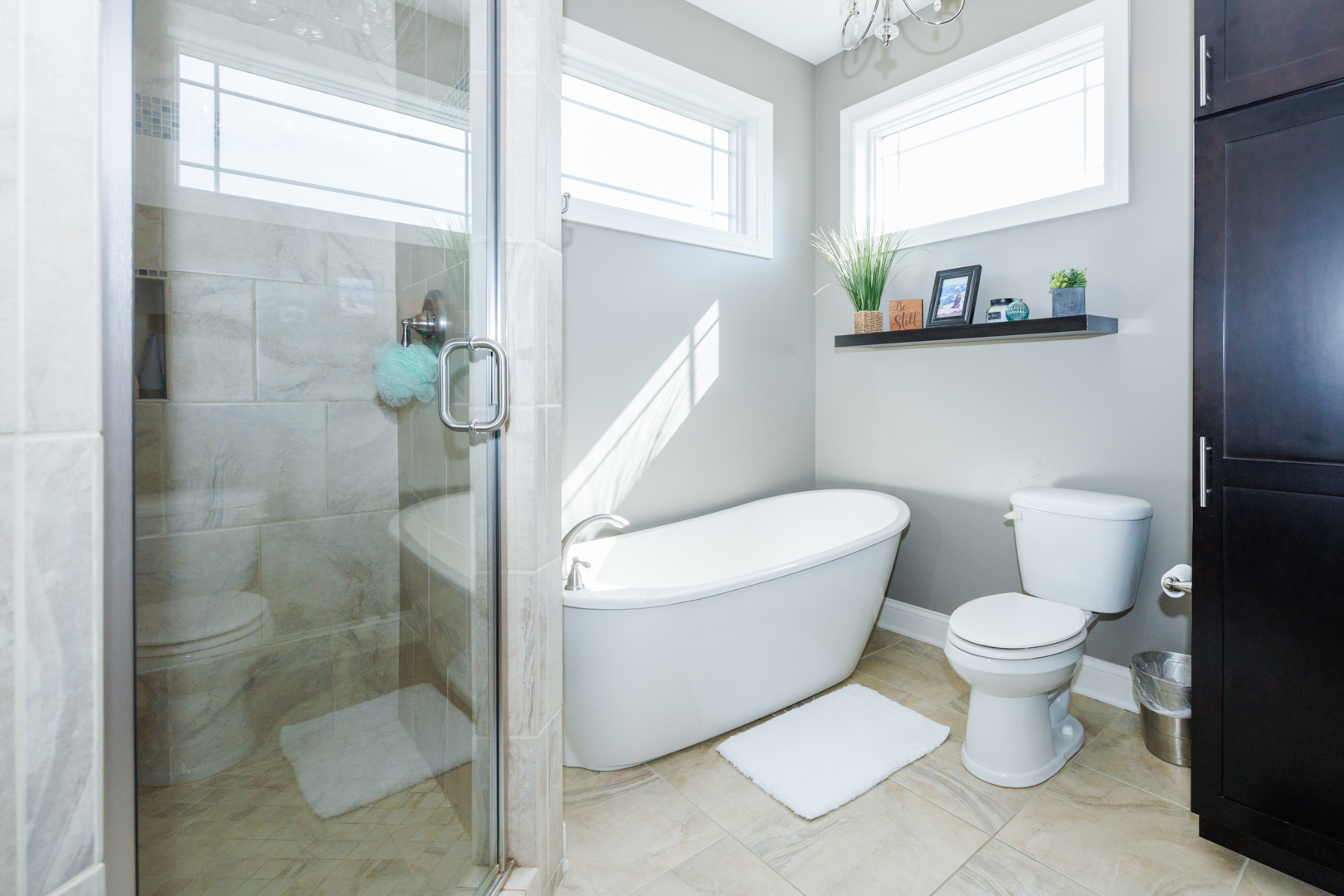 114 Mallard Way Hudson, IL 61748 - Photo 29 of 65 a white toilet sitting next to a bathroom sink