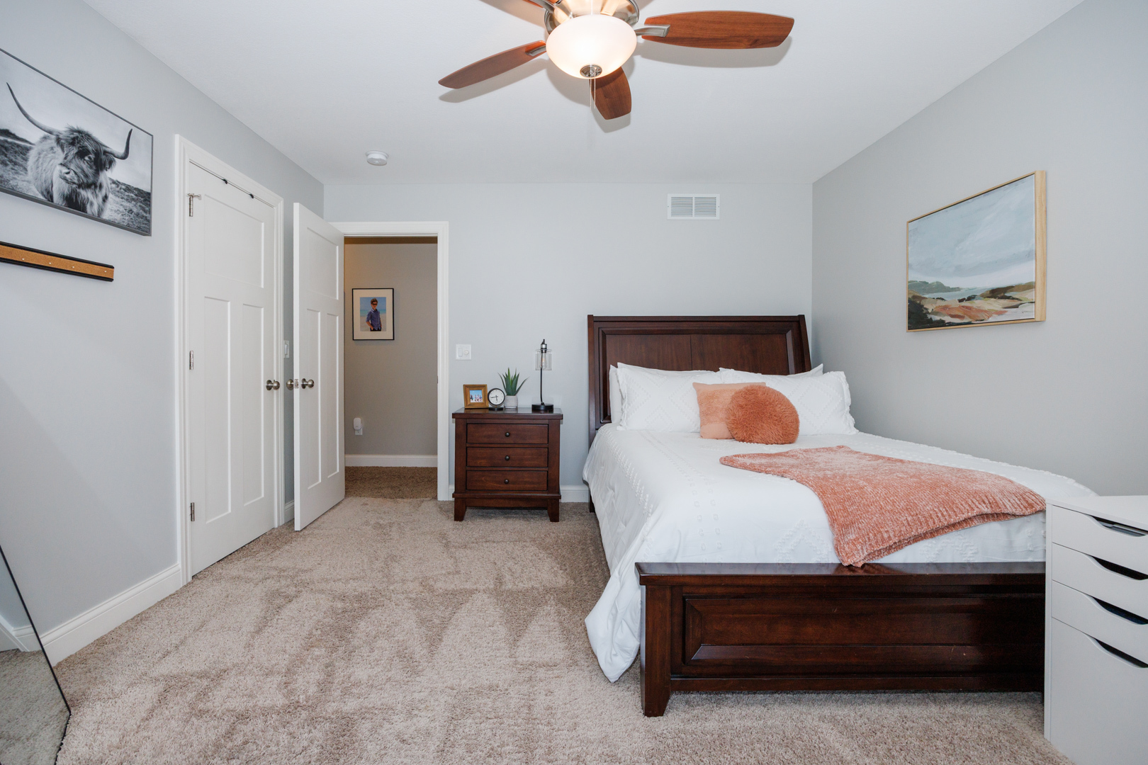 114 Mallard Way Hudson, IL 61748 - Photo 31 of 65 a bedroom with a bed and a chandelier