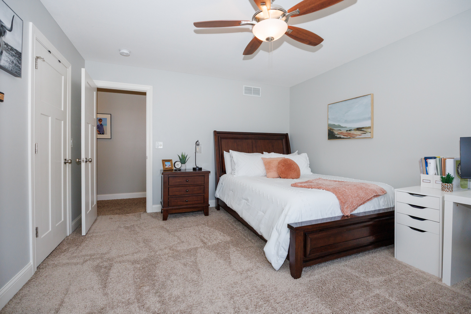 114 Mallard Way Hudson, IL 61748 - Photo 32 of 65 a bed room with a bed and a chandelier
