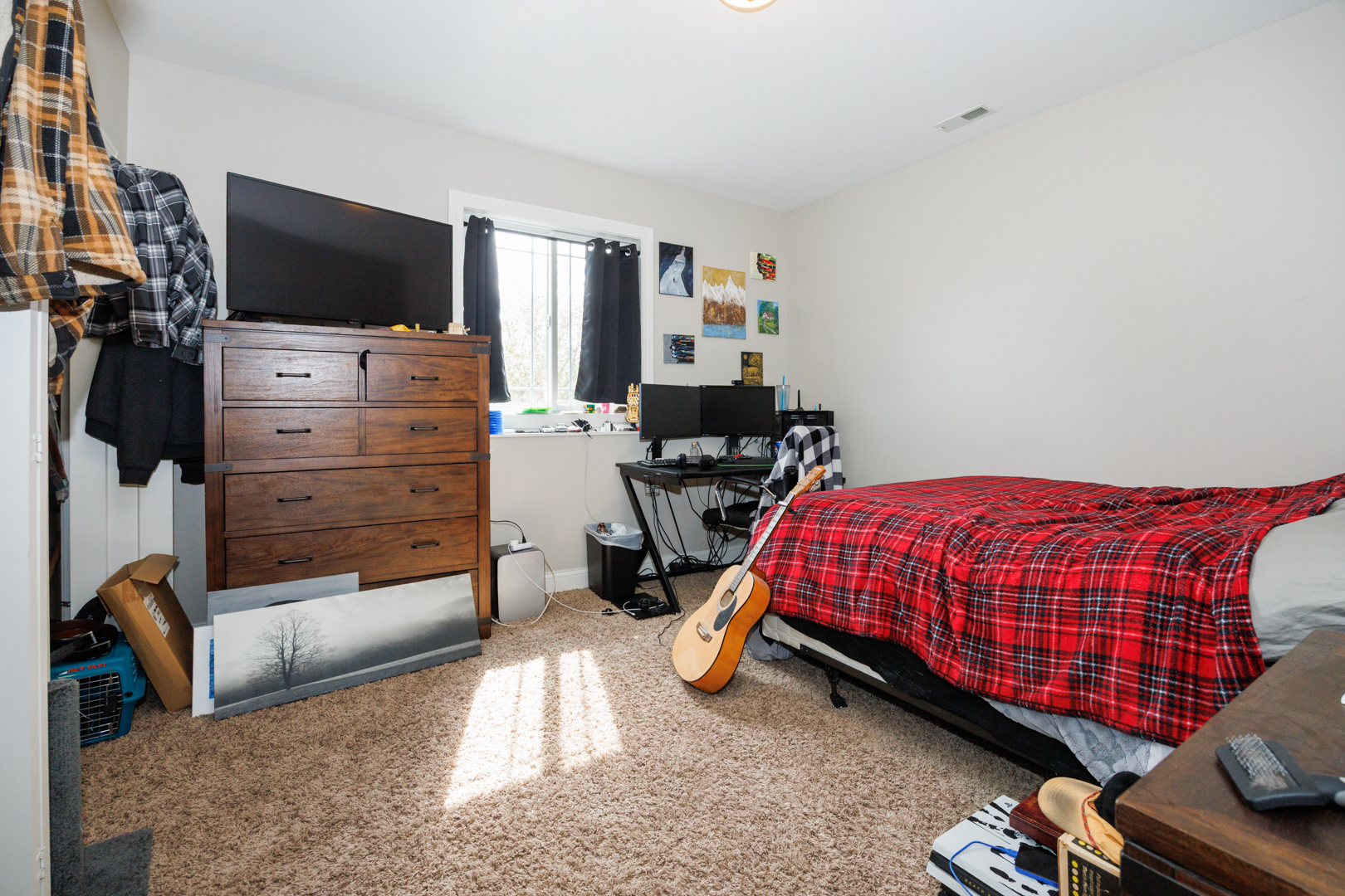 114 Mallard Way Hudson, IL 61748 - Photo 51 of 65 a bedroom with a bed and flat screen tv