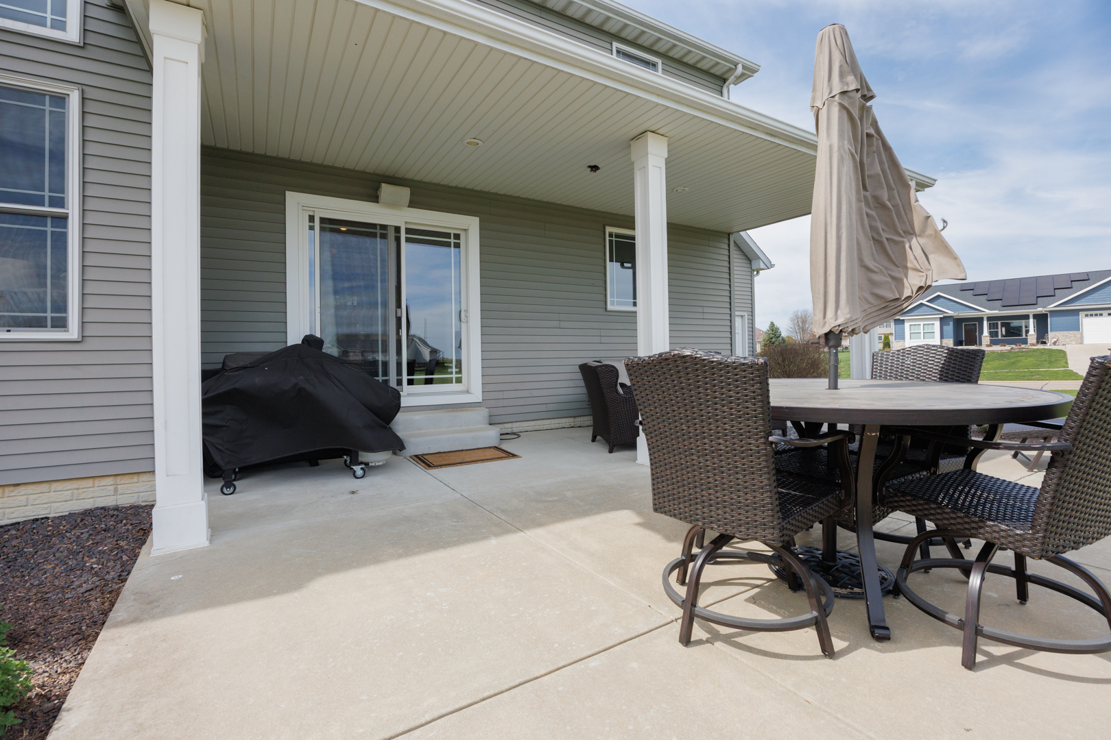 114 Mallard Way Hudson, IL 61748 - Photo 57 of 65 a backyard of a house with table and chairs