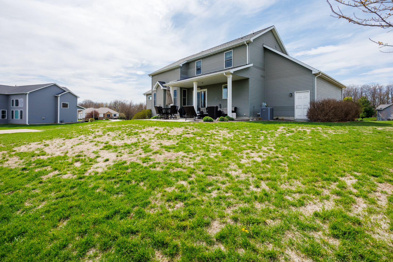 114 Mallard Way Hudson, IL 61748 - Photo 61 of 65 a view of a house with a yard