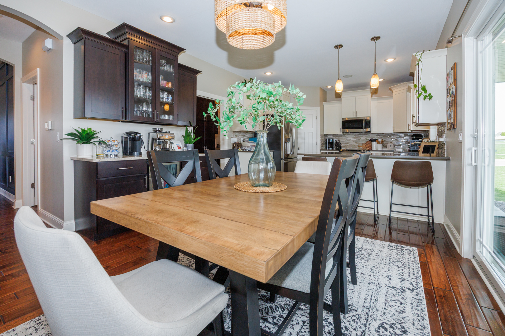 114 Mallard Way Hudson, IL 61748 - Photo 9 of 65 a dining room filled chandelier and wooden floor