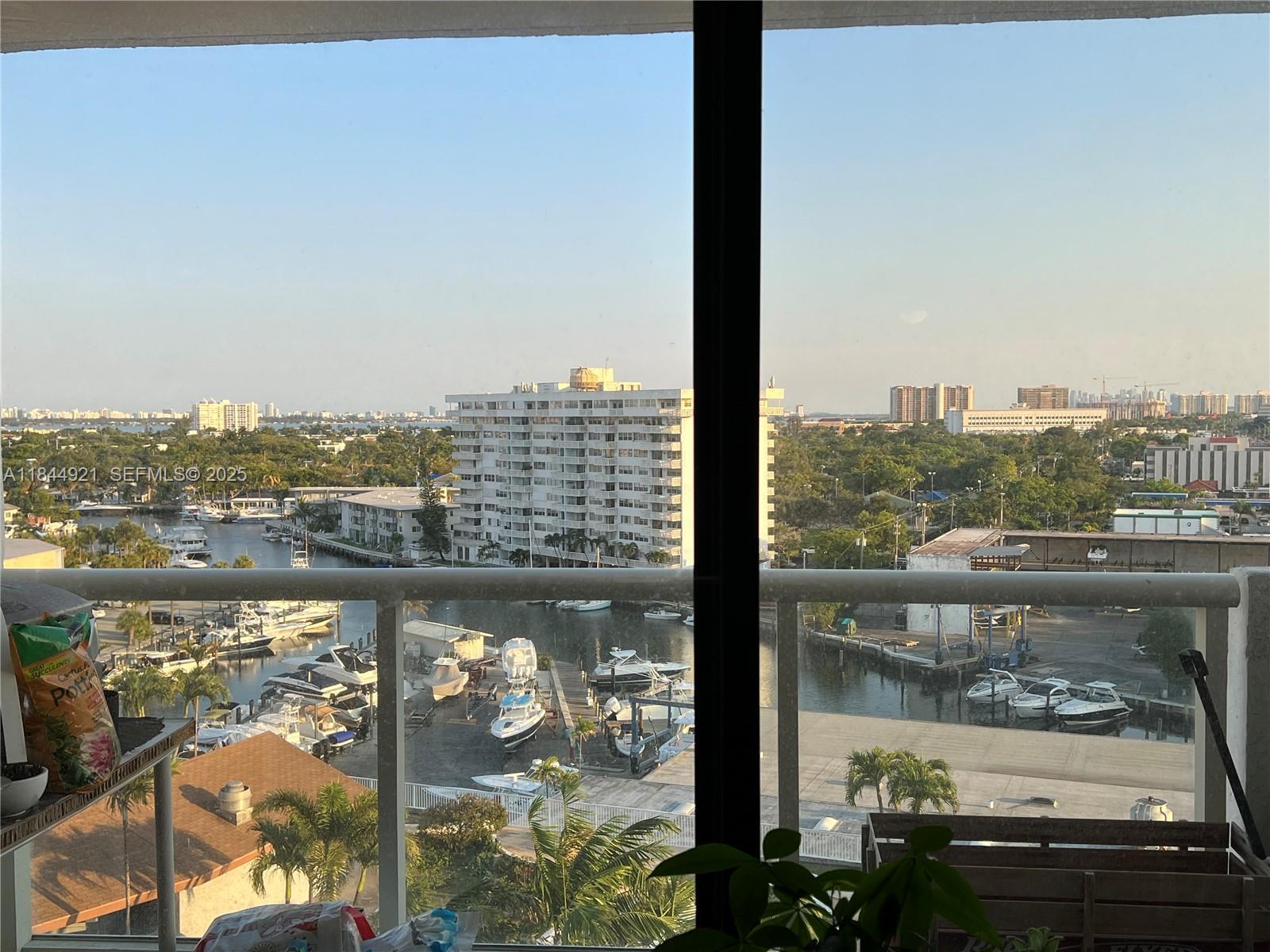 13499 Biscayne Boulevard, Unit 902 North Miami, FL 33181 - Photo 4 of 15 a city view from a balcony