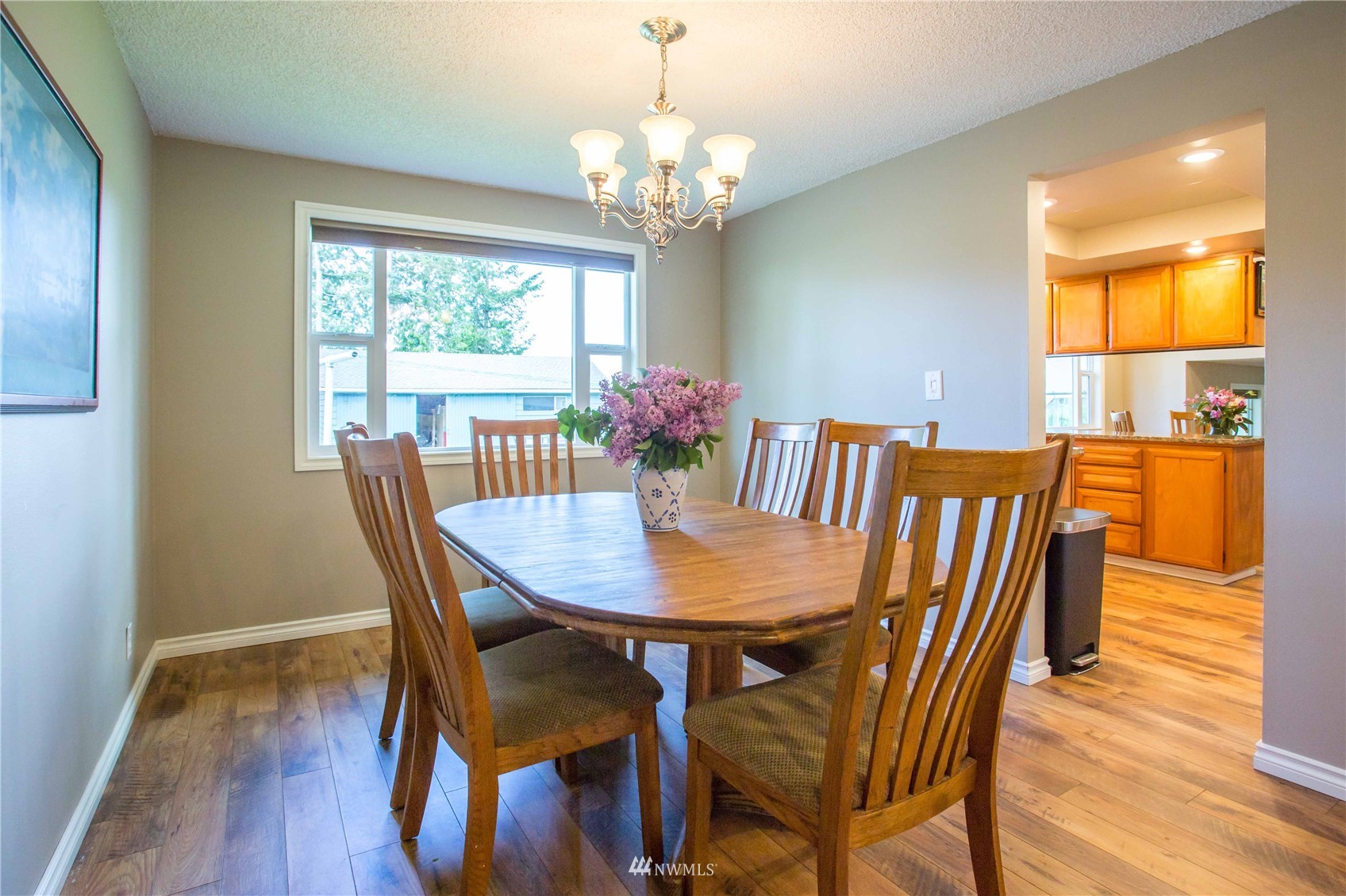 3951 Britton Road Bellingham, WA 98226 - Photo 15 of 39 a view of a dining room with furniture and wooden floor