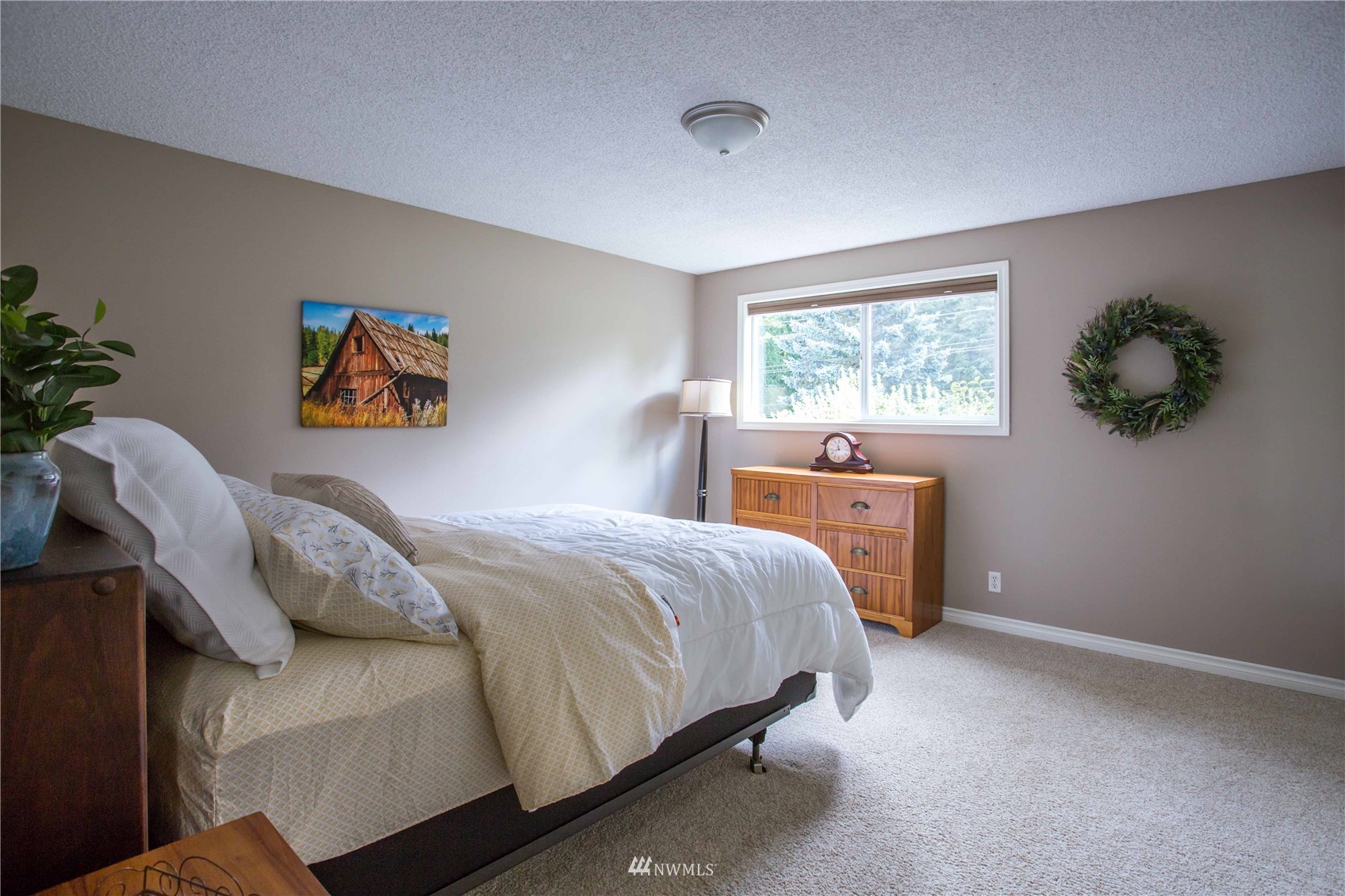 3951 Britton Road Bellingham, WA 98226 - Photo 28 of 39 a bedroom with a bed and a window