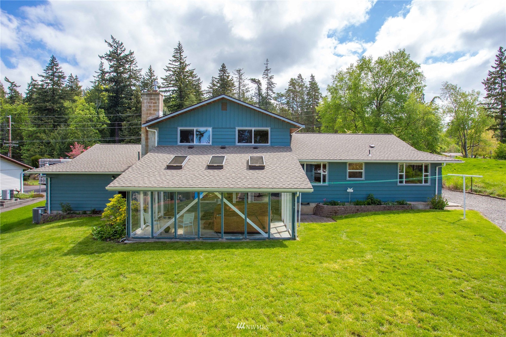 3951 Britton Road Bellingham, WA 98226 - Photo 35 of 39 a front view of a house with a yard