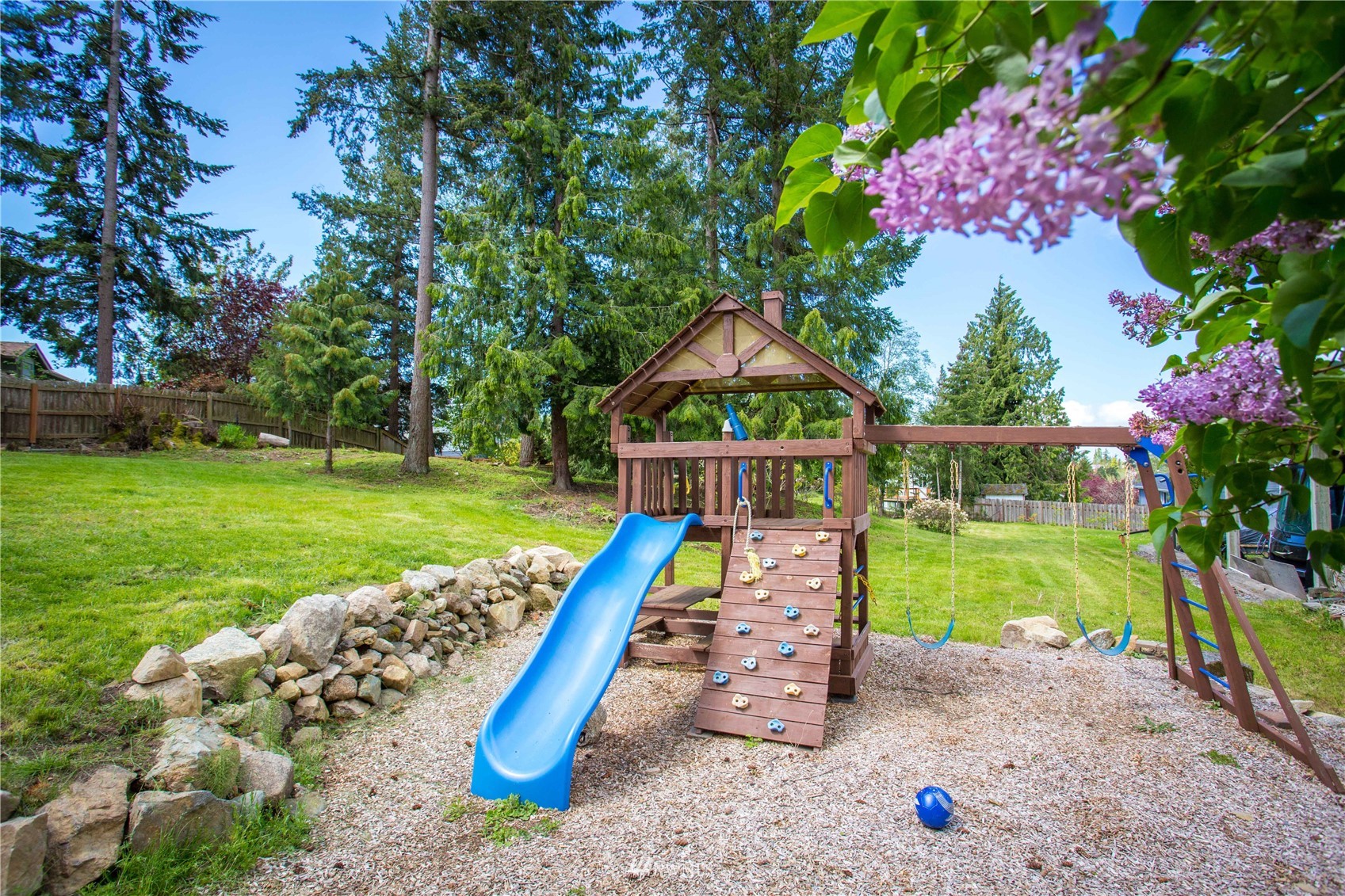 3951 Britton Road Bellingham, WA 98226 - Photo 36 of 39 a view of a backyard with a garden and entertaining space
