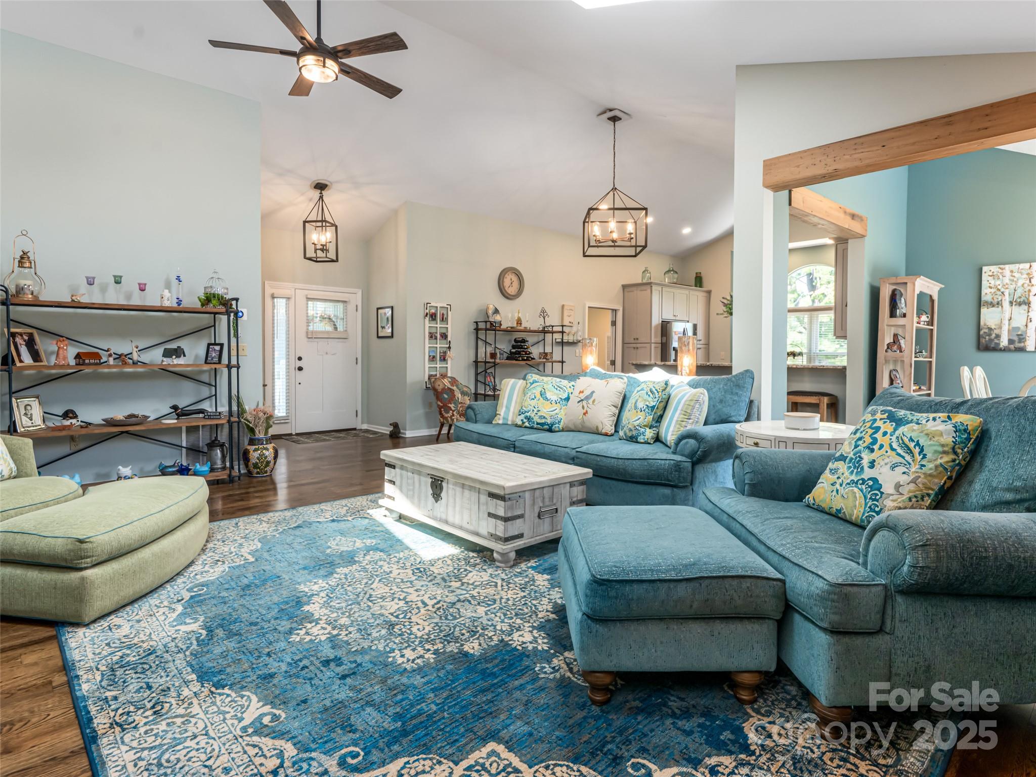 206 Pinner Road Arden, NC 28704 - Photo 11 of 47 a living room with furniture and a chandelier