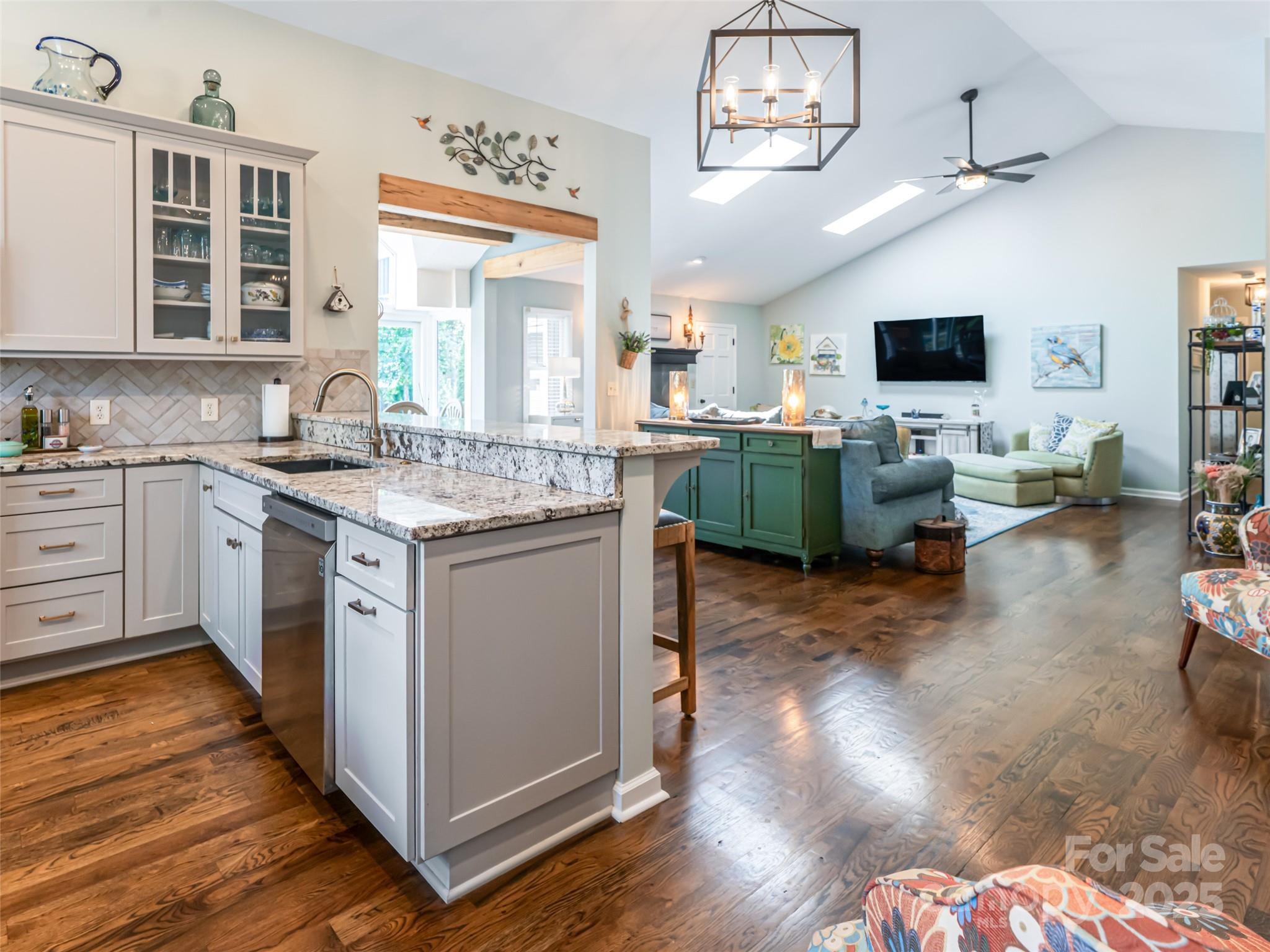 206 Pinner Road Arden, NC 28704 - Photo 15 of 47 a kitchen with cabinets a sink and appliances