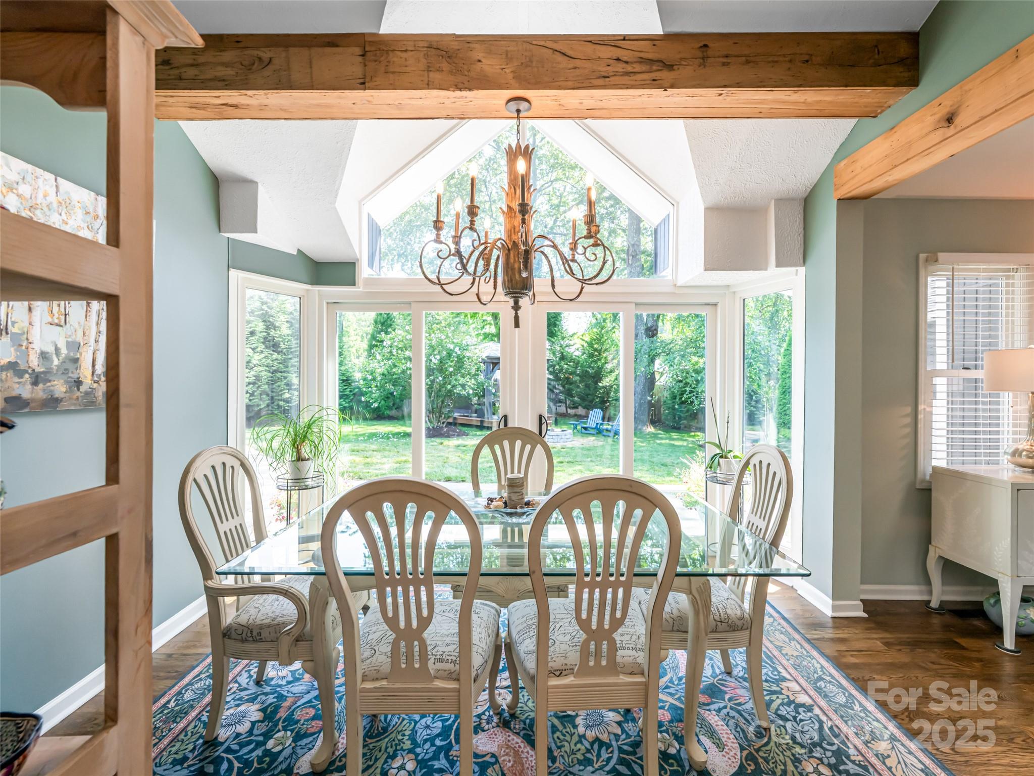 206 Pinner Road Arden, NC 28704 - Photo 19 of 47 a view of a dining room with furniture window and outside view