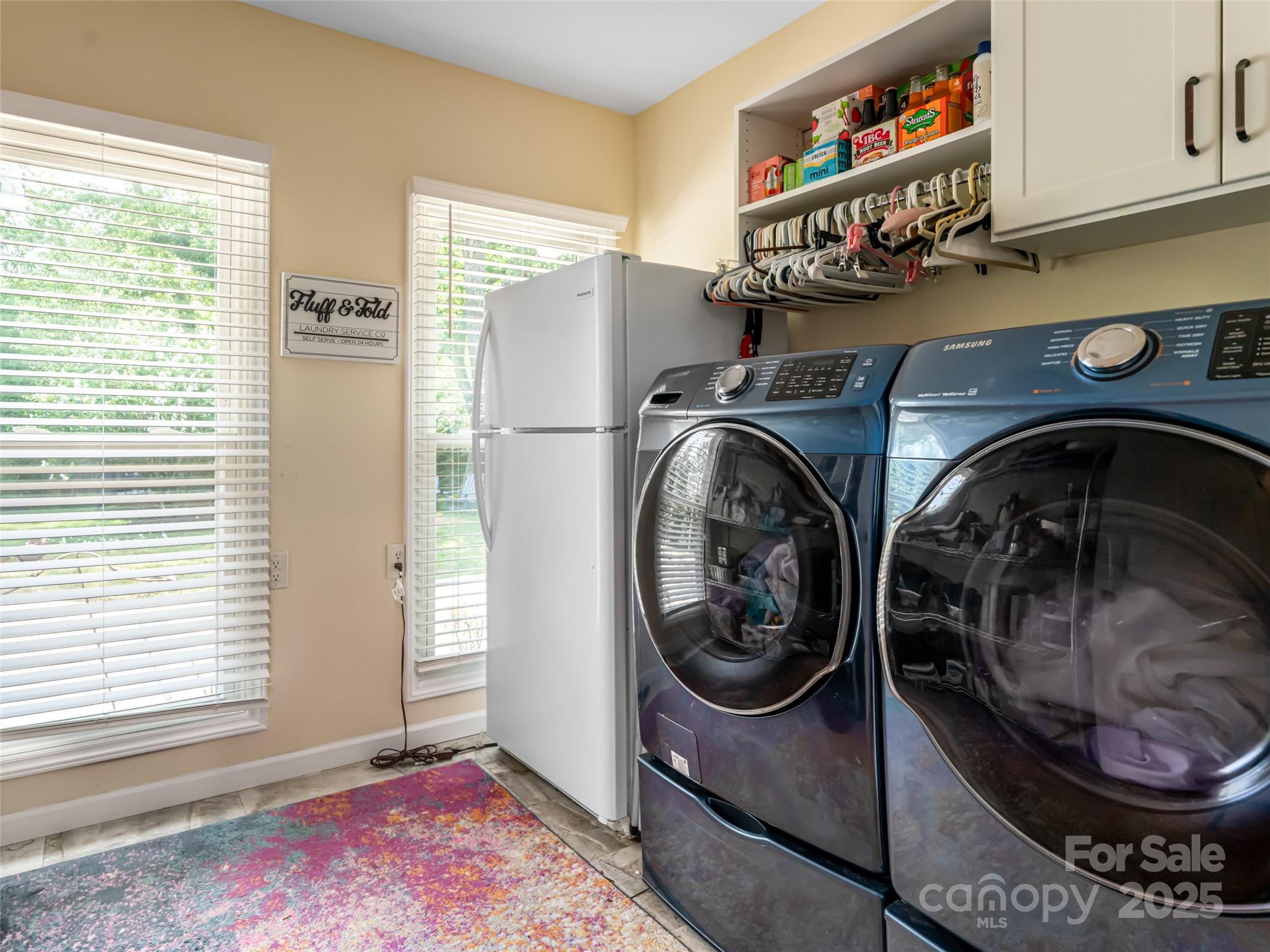 206 Pinner Road Arden, NC 28704 - Photo 21 of 47 a utility room with sink dryer and washer