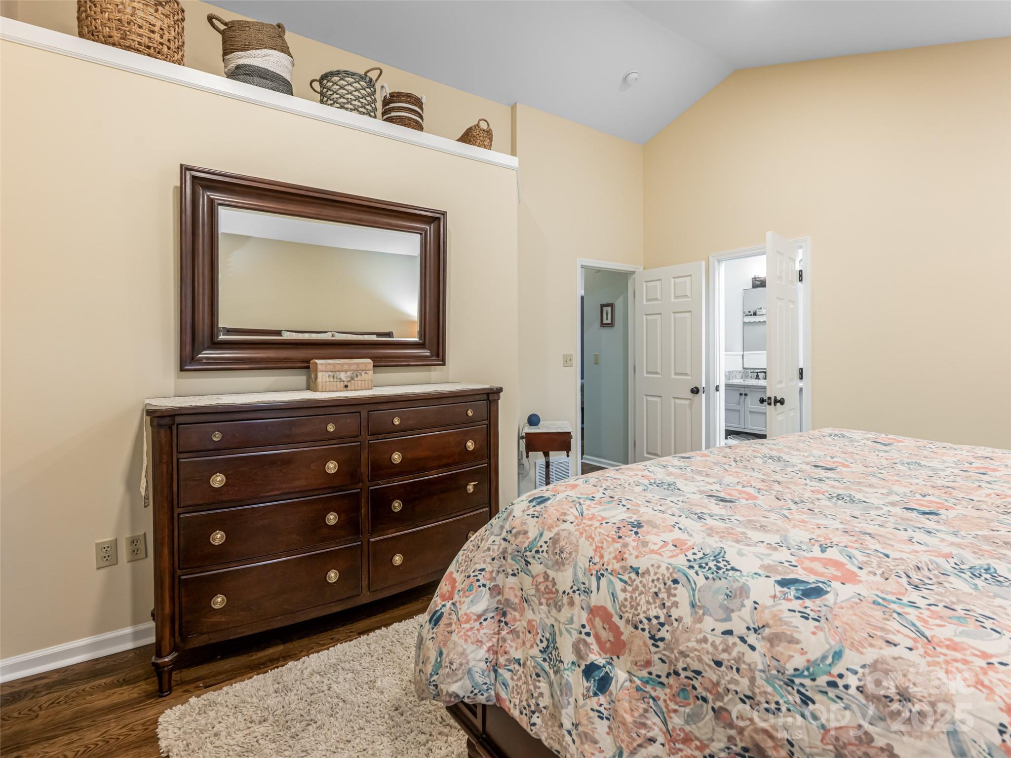 206 Pinner Road Arden, NC 28704 - Photo 29 of 47 a bedroom with a bed and a flat screen tv