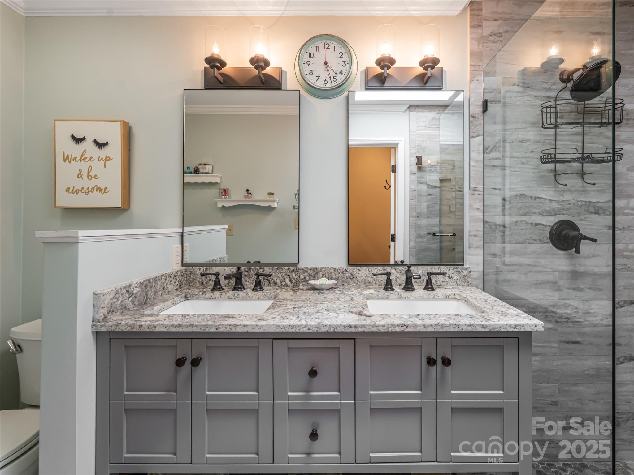 206 Pinner Road Arden, NC 28704 - Photo 30 of 47 a bathroom with a sink and a mirror