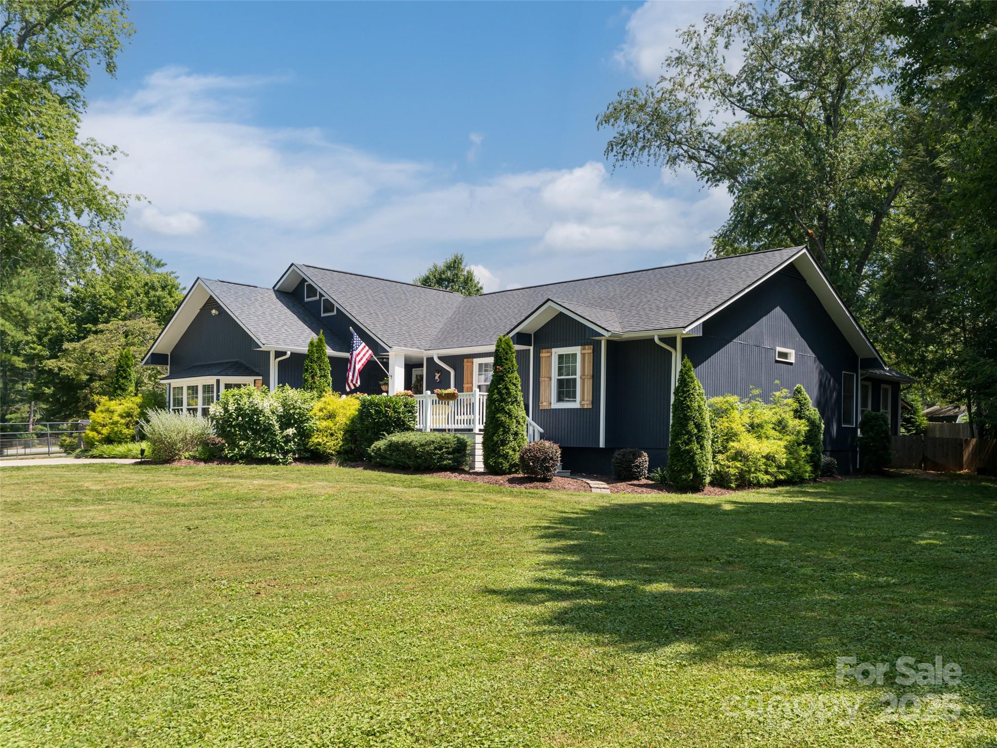 206 Pinner Road Arden, NC 28704 - Photo 3 of 47 a front view of house with yard and green space