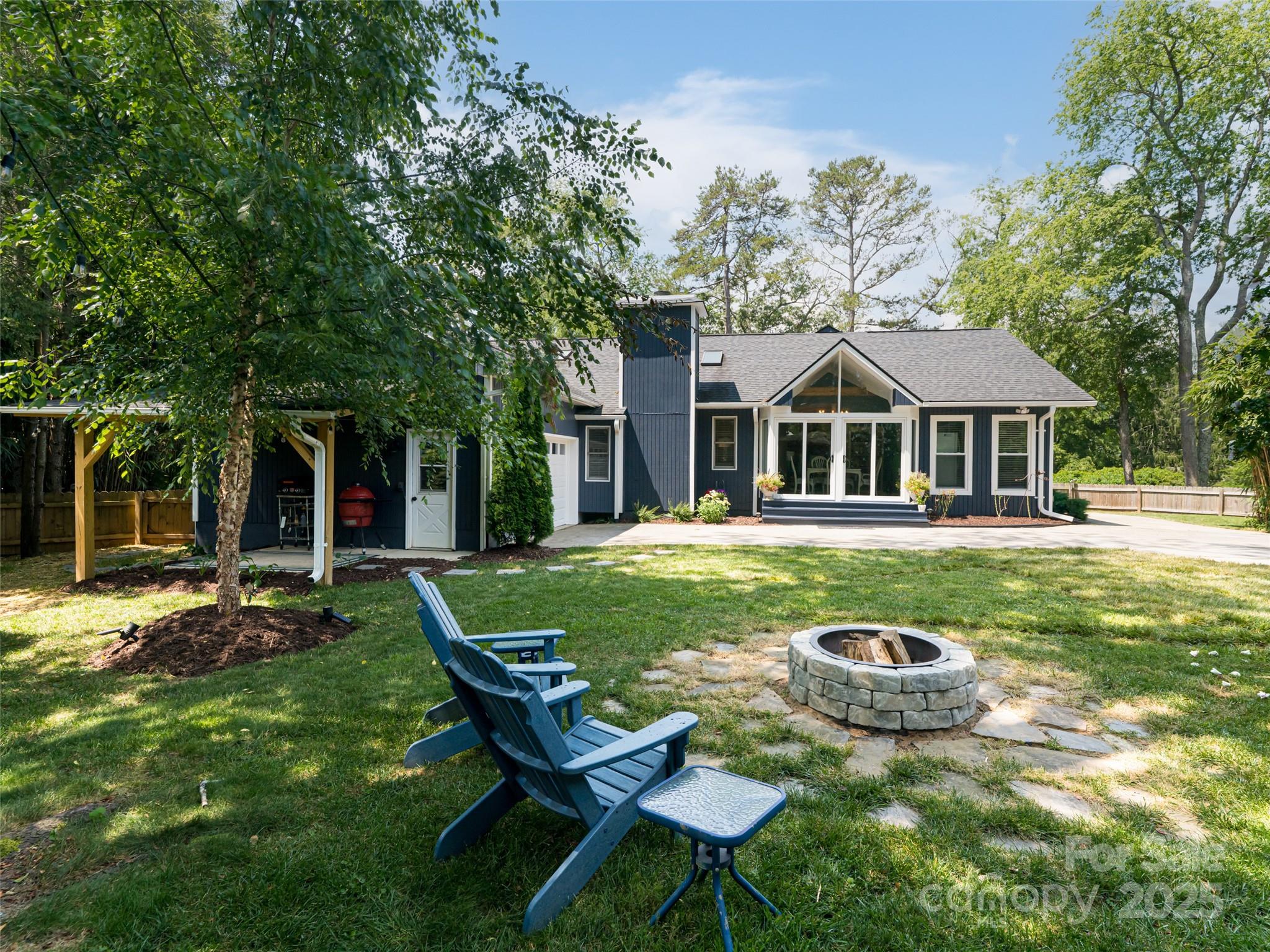 206 Pinner Road Arden, NC 28704 - Photo 37 of 47 a front view of a house with swimming pool and porch