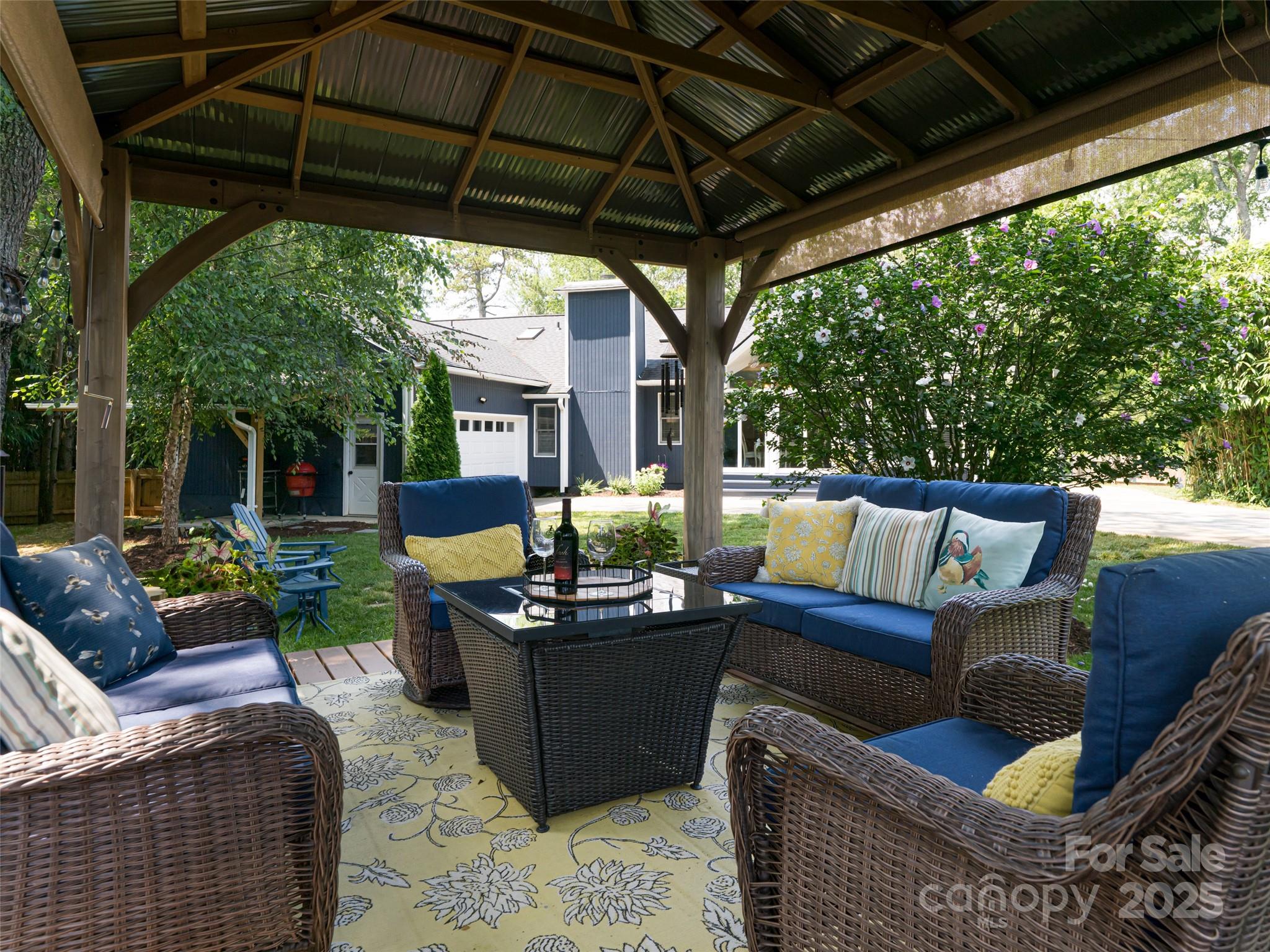 206 Pinner Road Arden, NC 28704 - Photo 40 of 47 a outdoor living space with furniture and garden