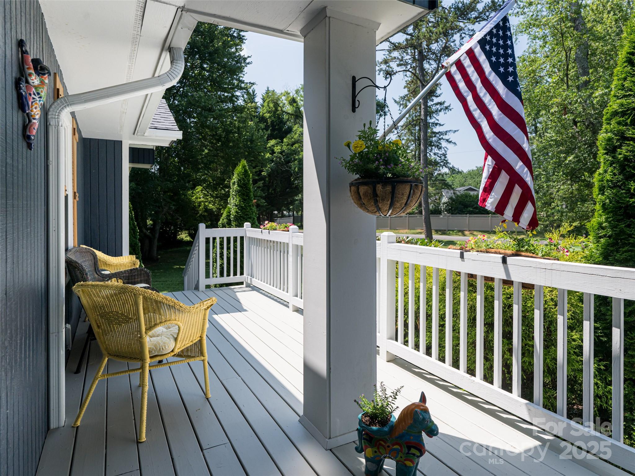 206 Pinner Road Arden, NC 28704 - Photo 5 of 47 a view of balcony with wooden floor and outdoor seating