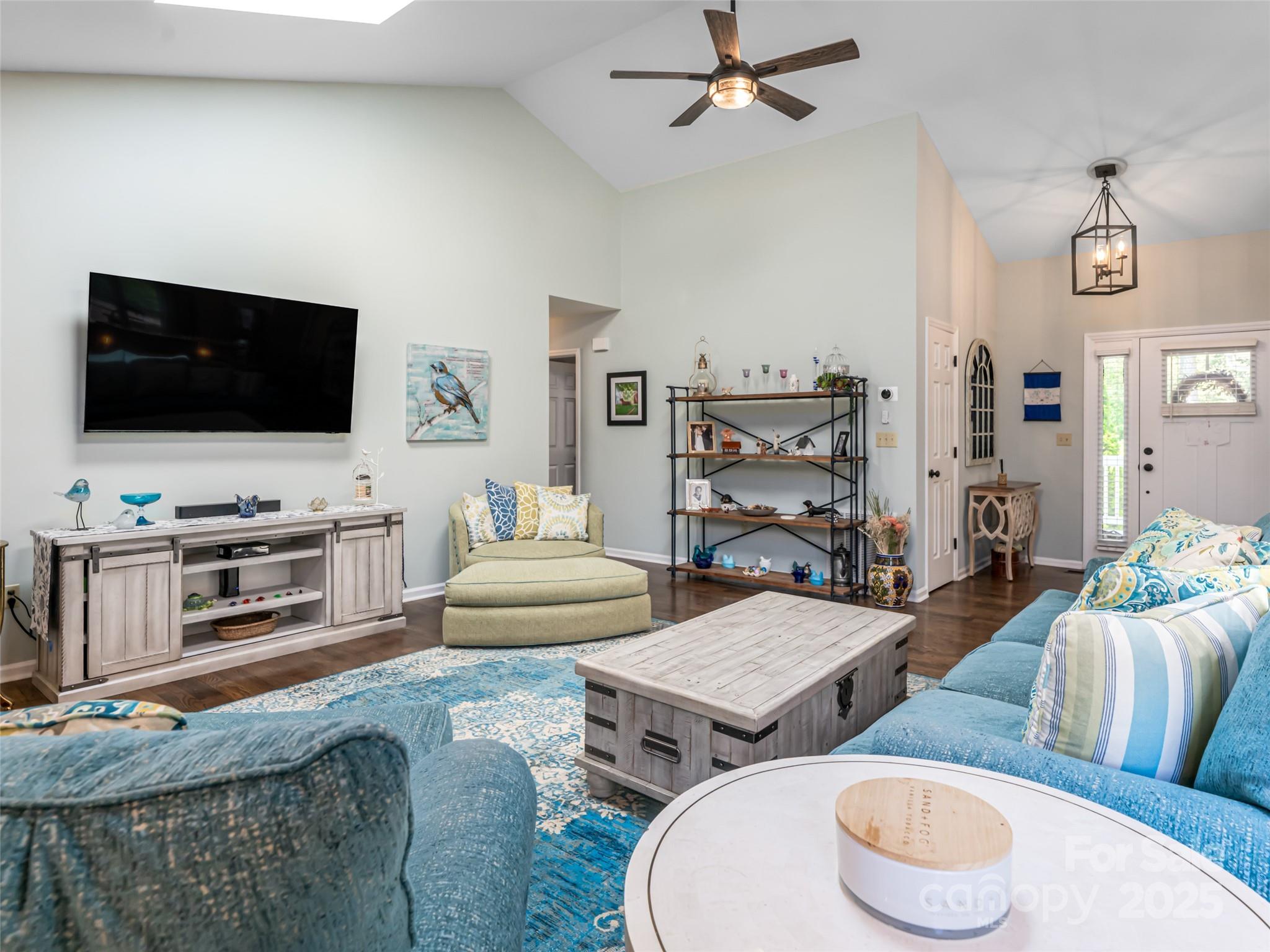 206 Pinner Road Arden, NC 28704 - Photo 10 of 47 a living room with furniture and a flat screen tv