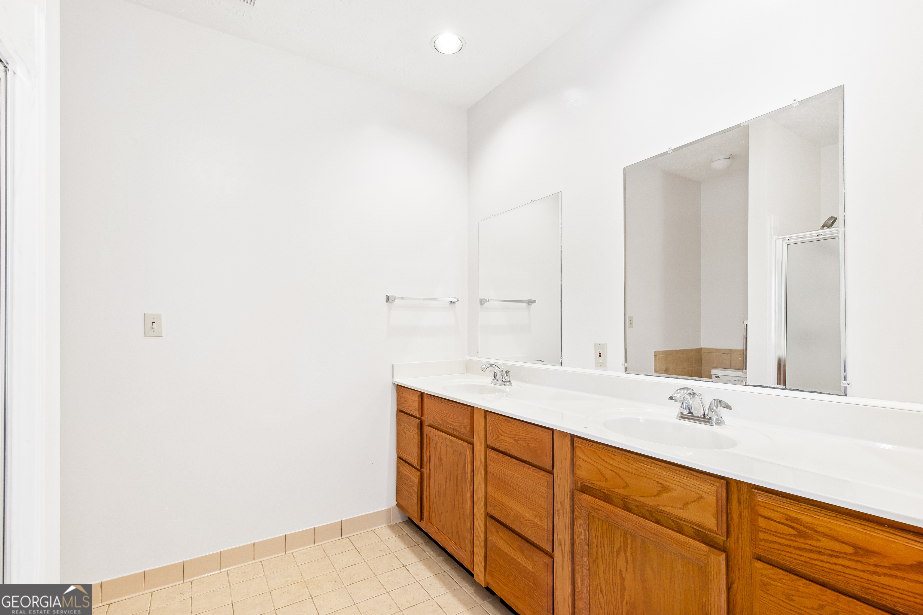 273 High Point Road Buchanan, GA 30113 - Photo 21 of 73 a bathroom with a sink and a mirror